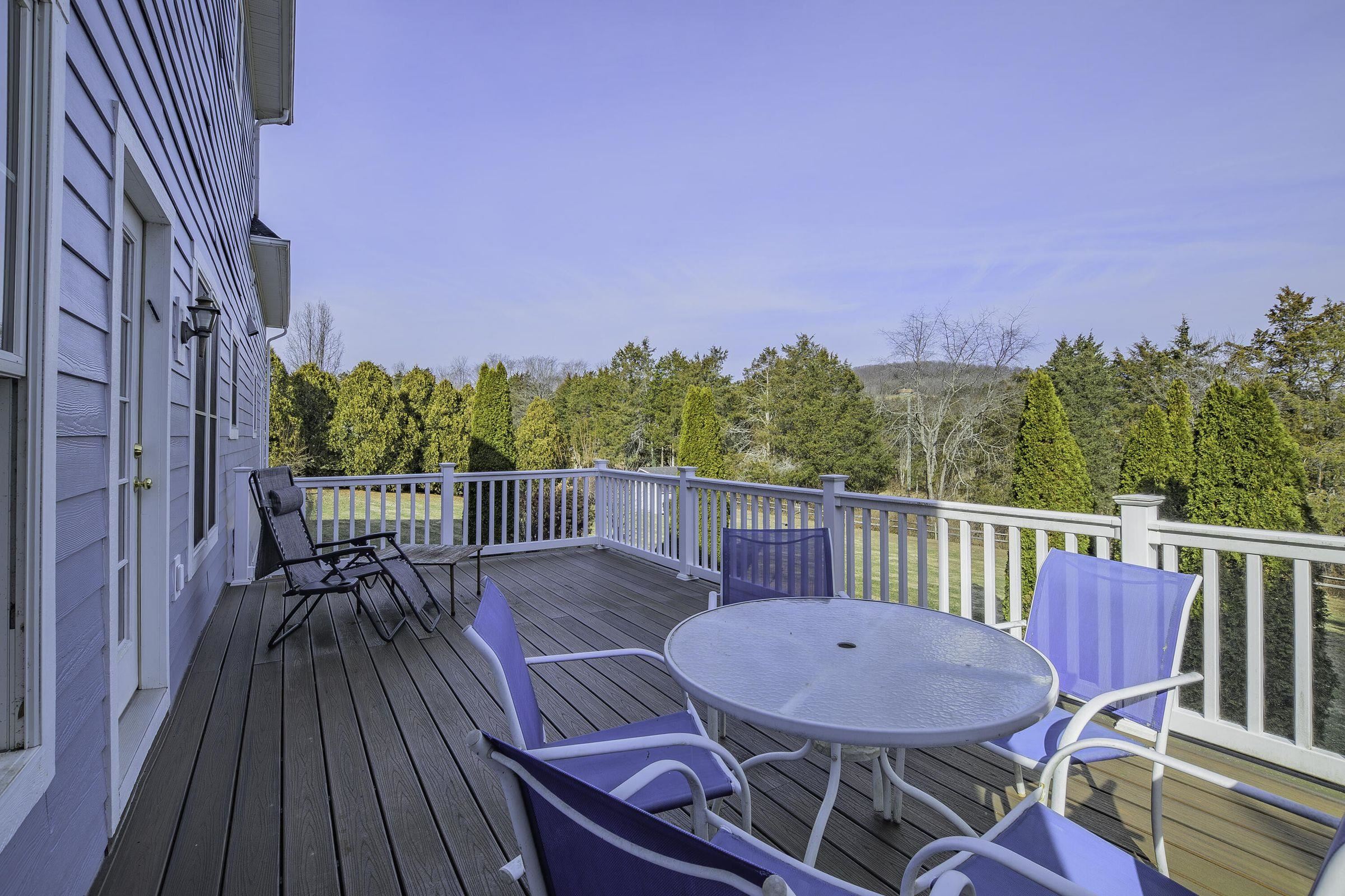 Enjoy summer picnics on the rear balcony/deck. Enjoy summer picnics on the rear balcony/deck.