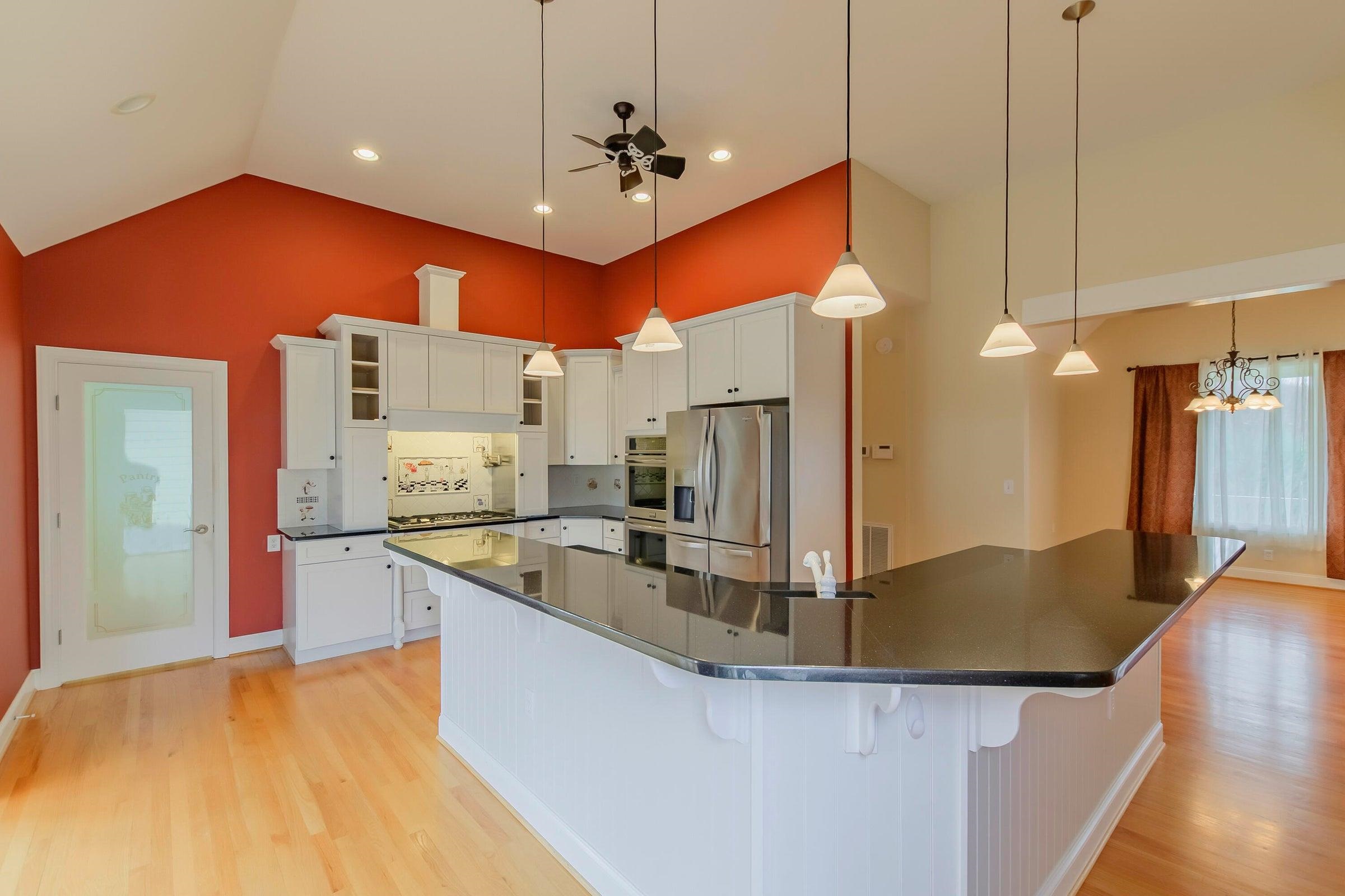 The door to the right of the kitchen is a convenient pantry!