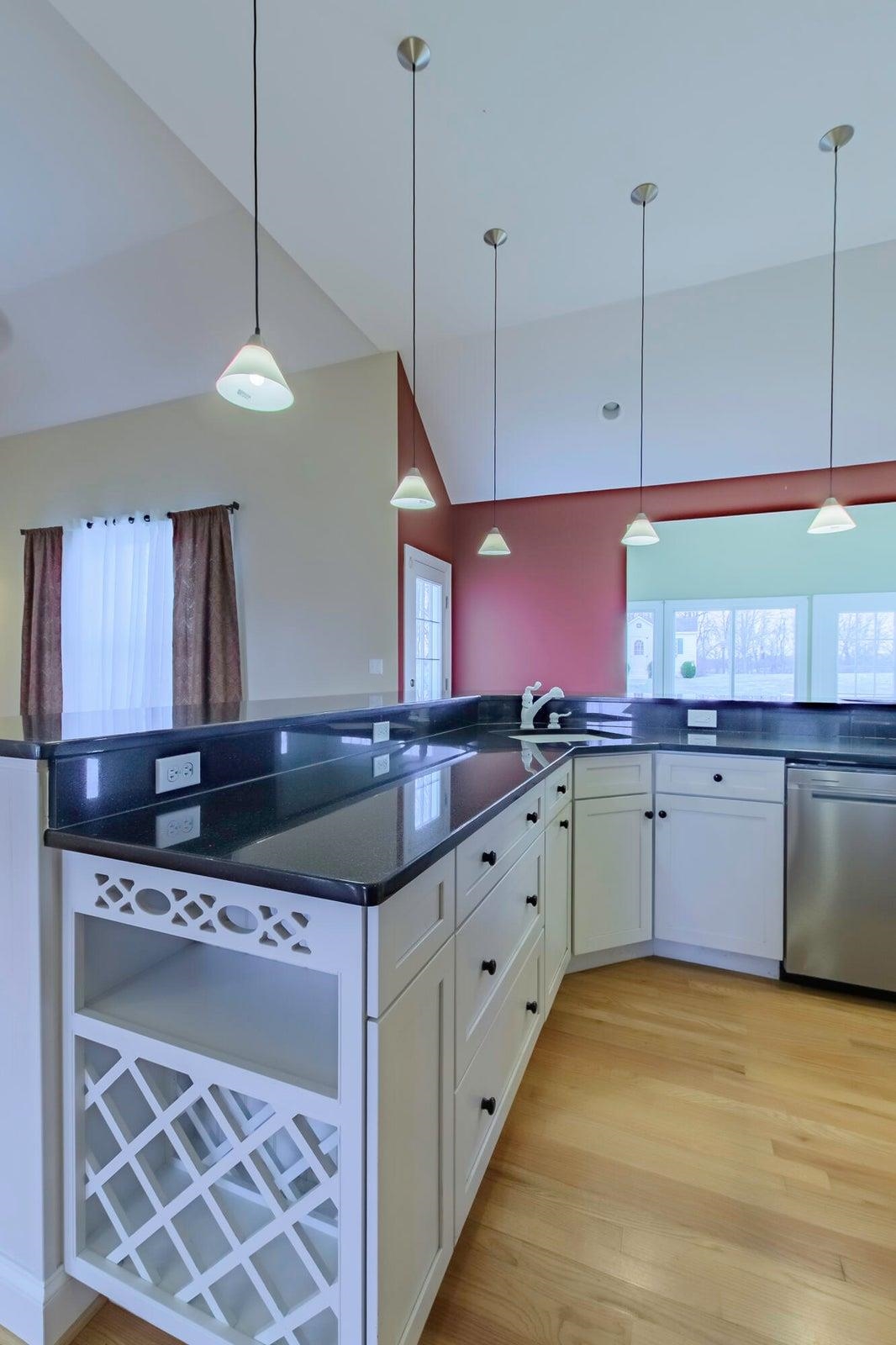 The chef can be cooking and chatting with guests at the same time.