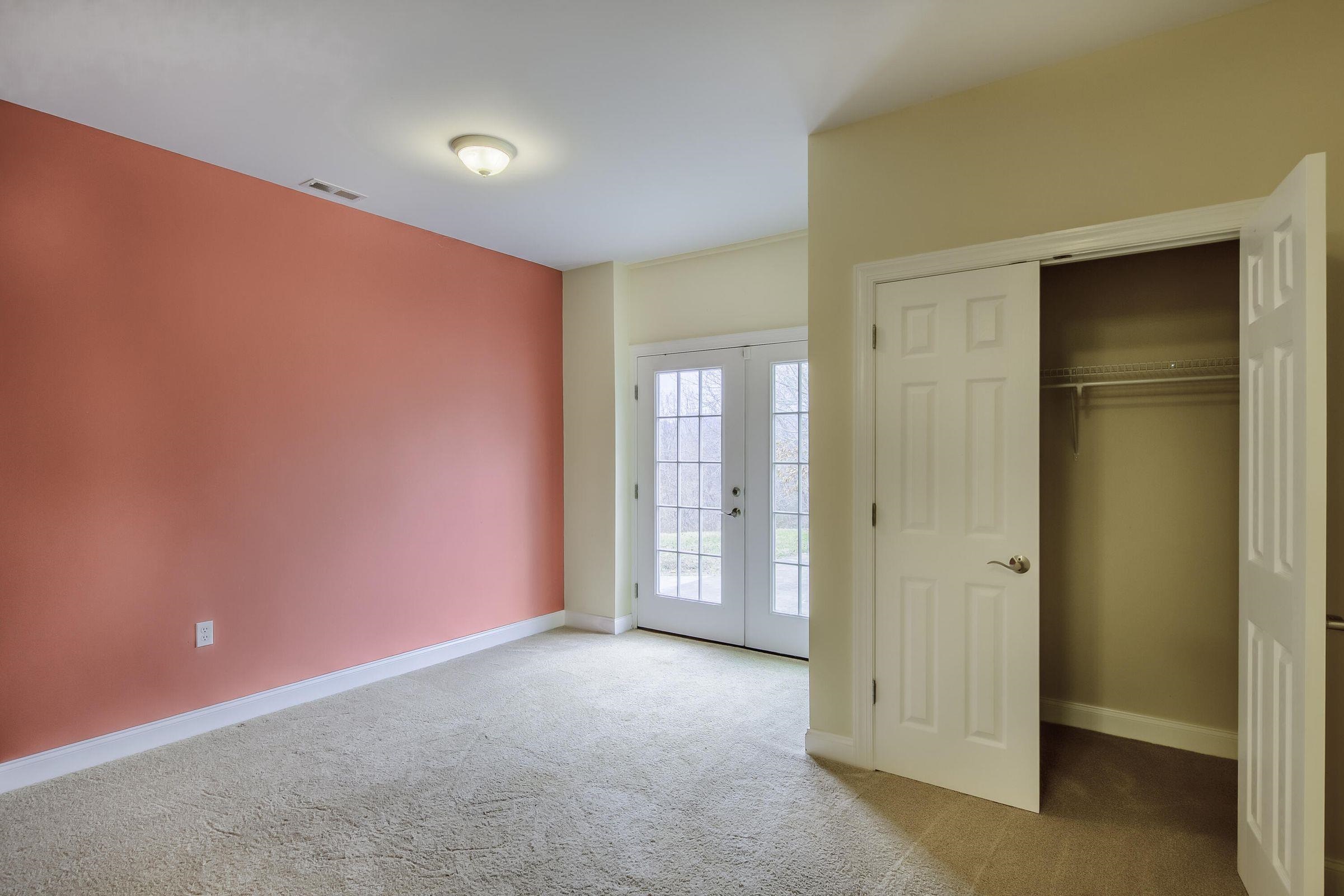 Door leads out from the lower level onto a patio.