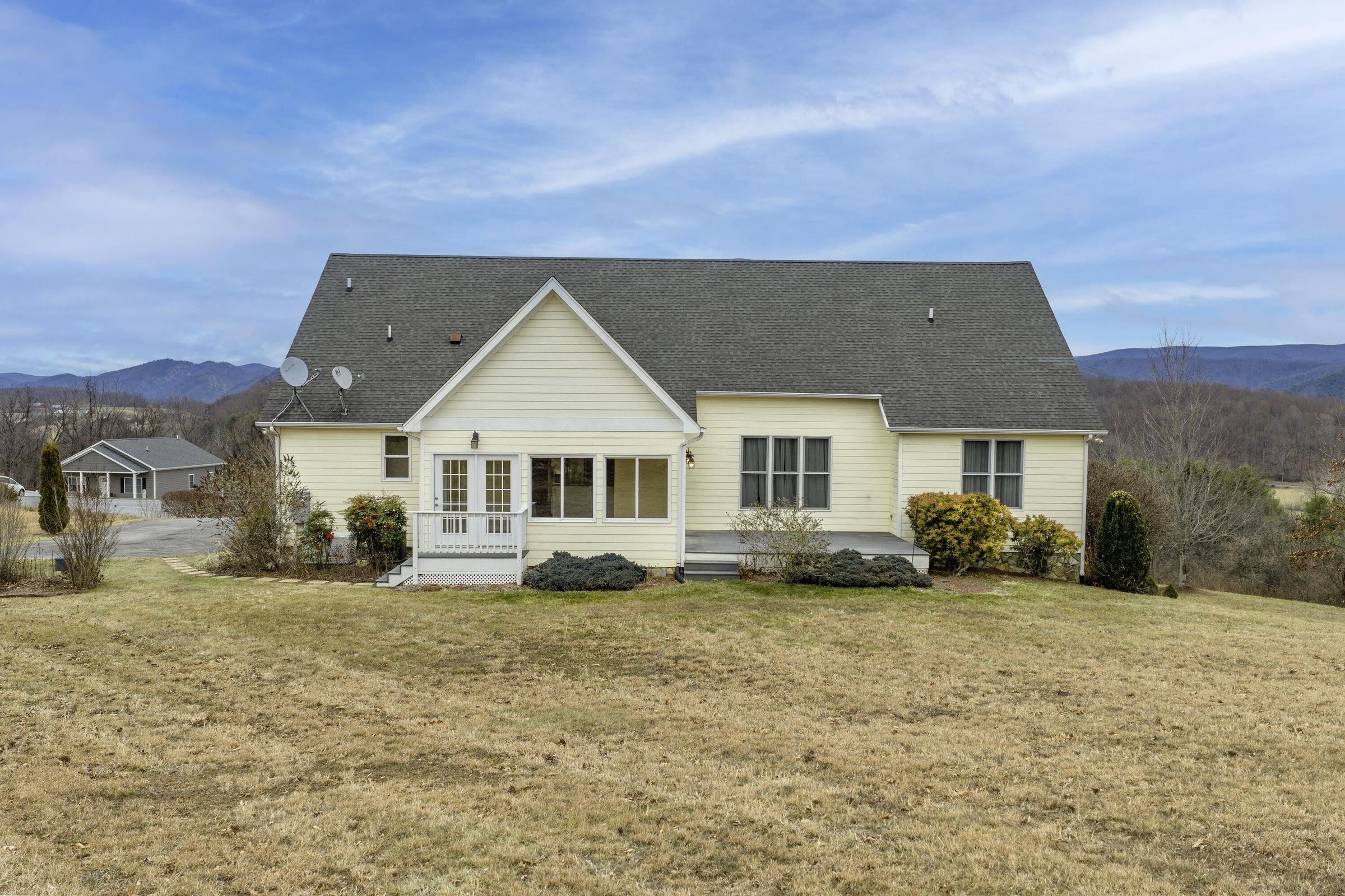 Back of house features the sun room.