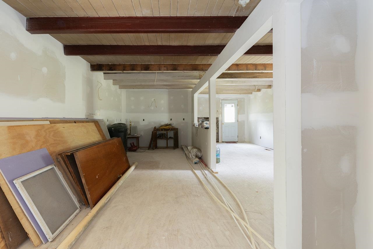 Spacious kitchen area with new plumbing and electrical.