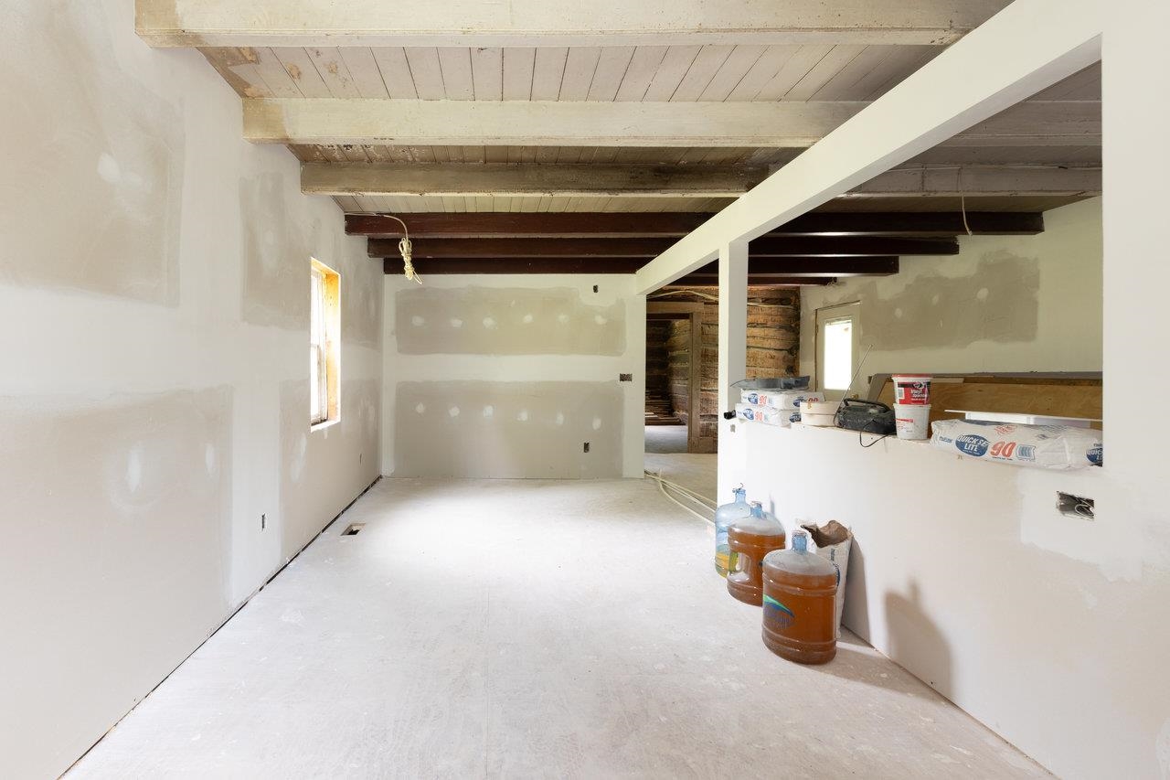 Lovely dining area with window for natural light and a breakfast bar.