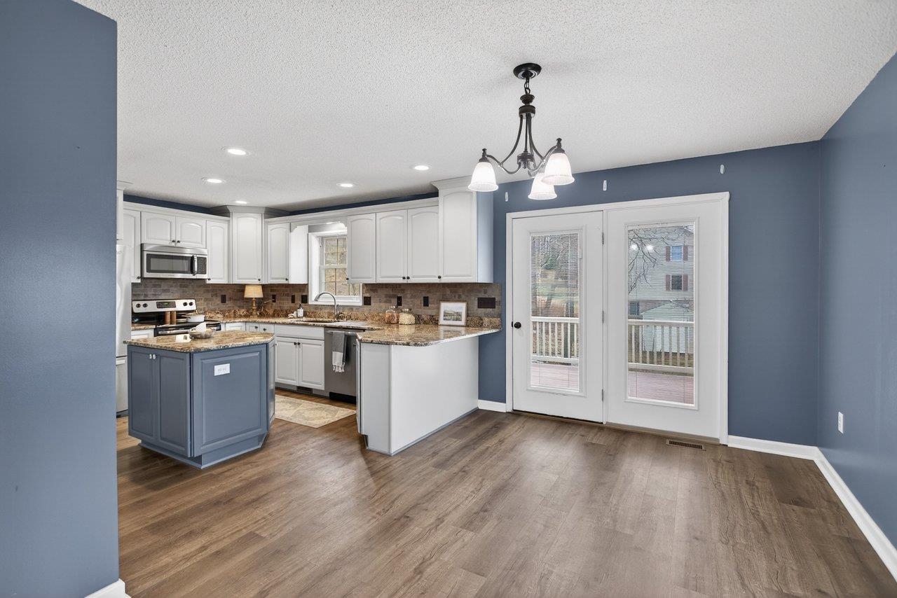 *french doors lead out to the deck area