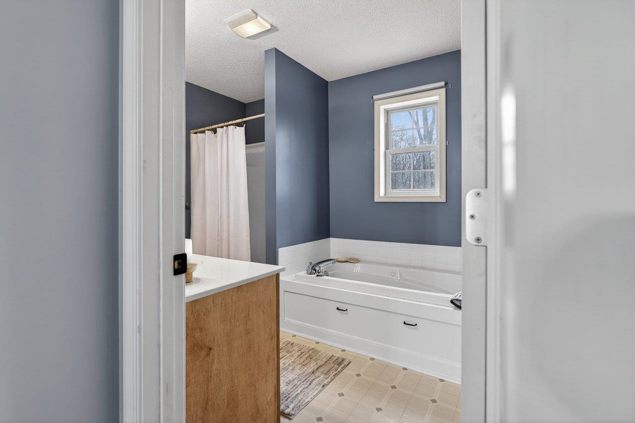 *whirlpool tub, double sinks and shower
