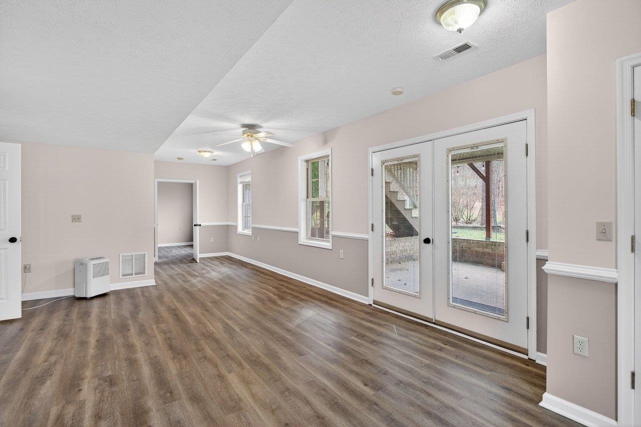 *french doors lead to patio and backyard