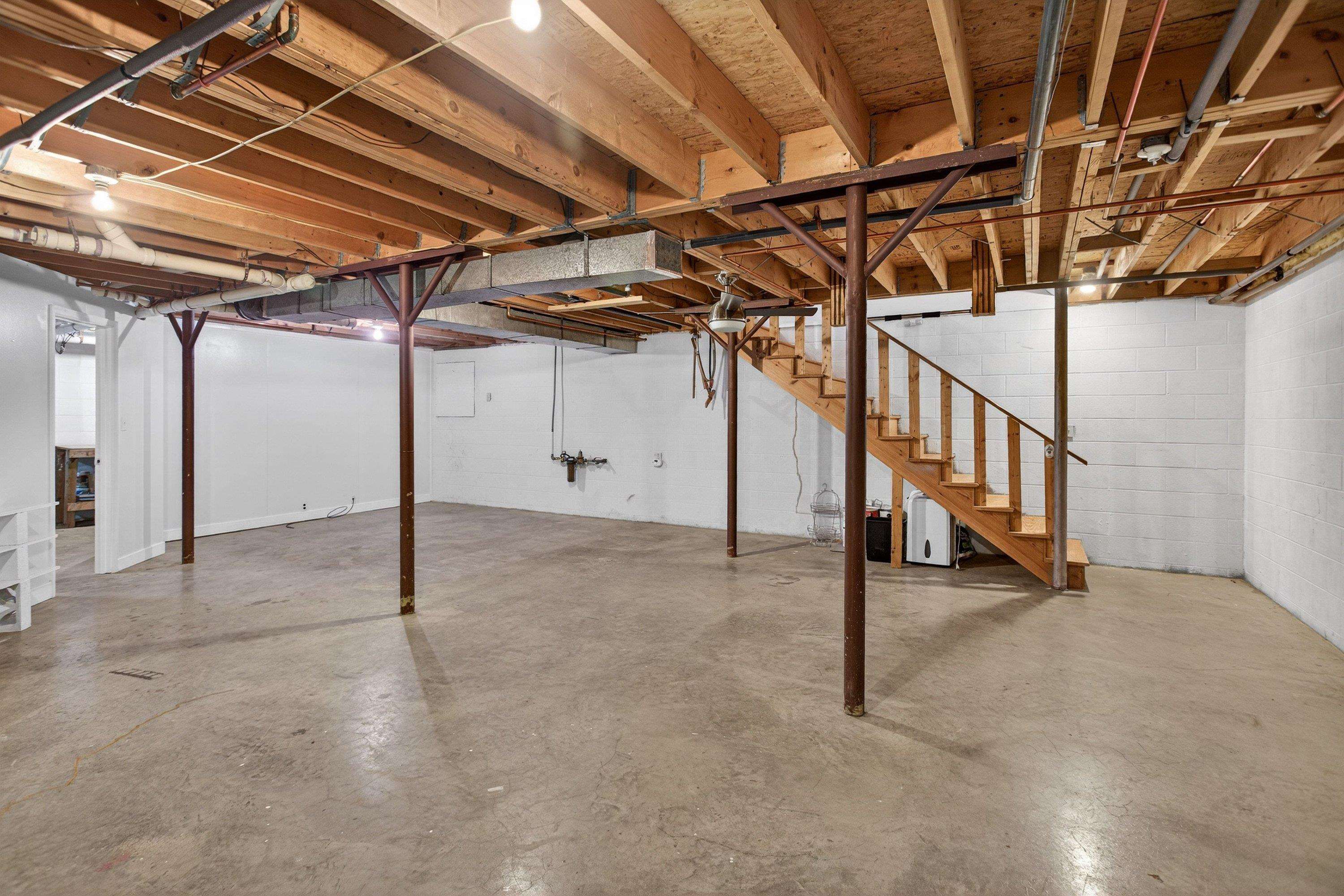This unfinished basement space offers the opportunity for storage, exercise area, and much more!