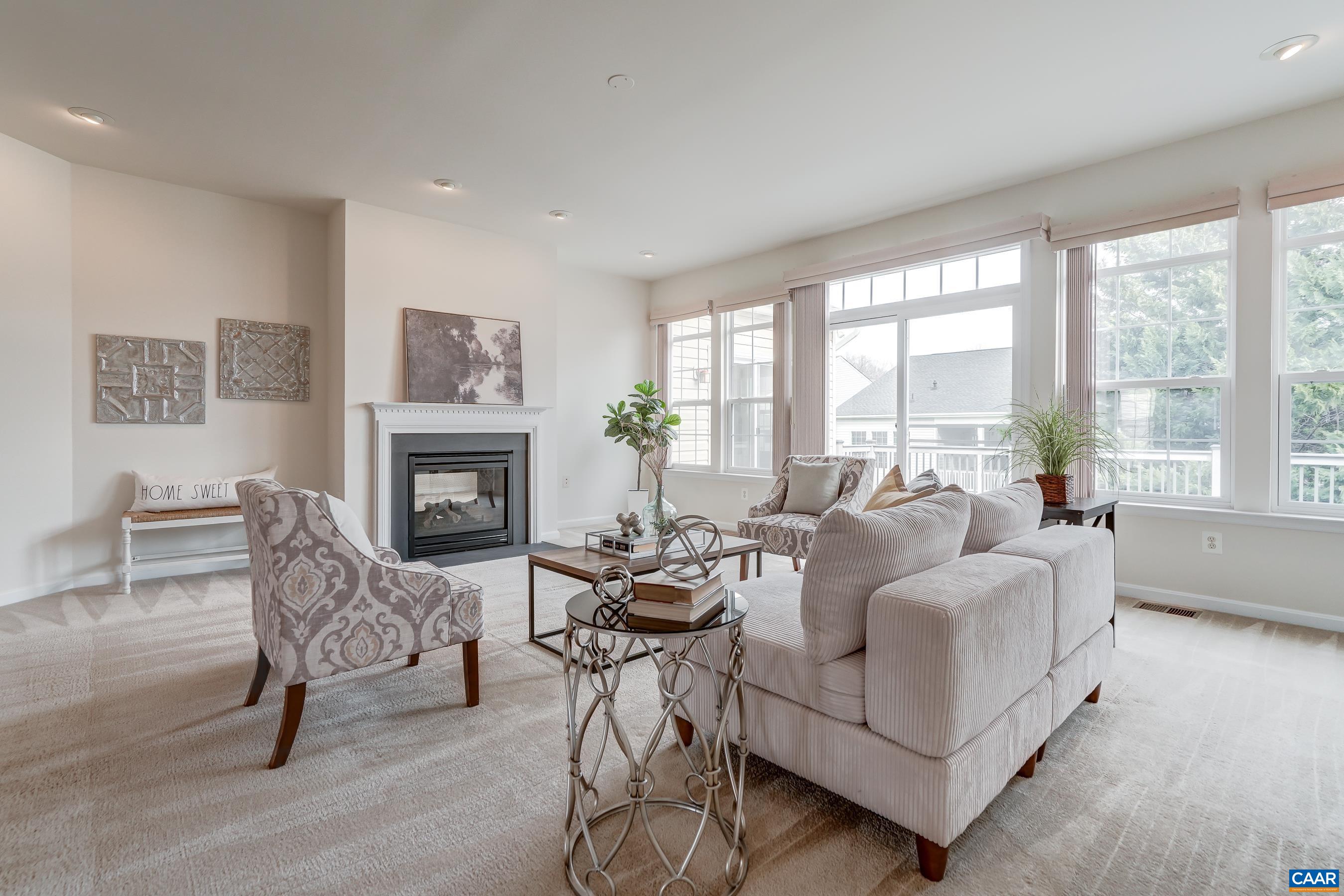 Hunter Douglas vertical blinds throughout the home provide light control and privacy.