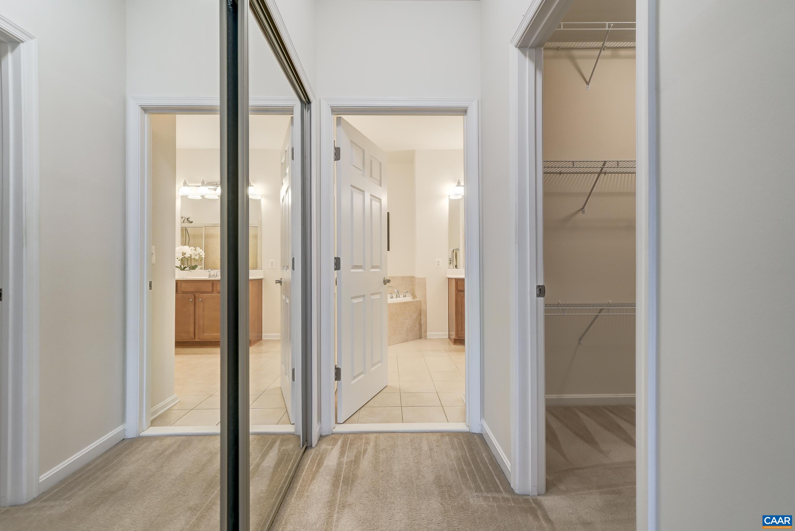 Two closets in the primary suite offer so much storage!
