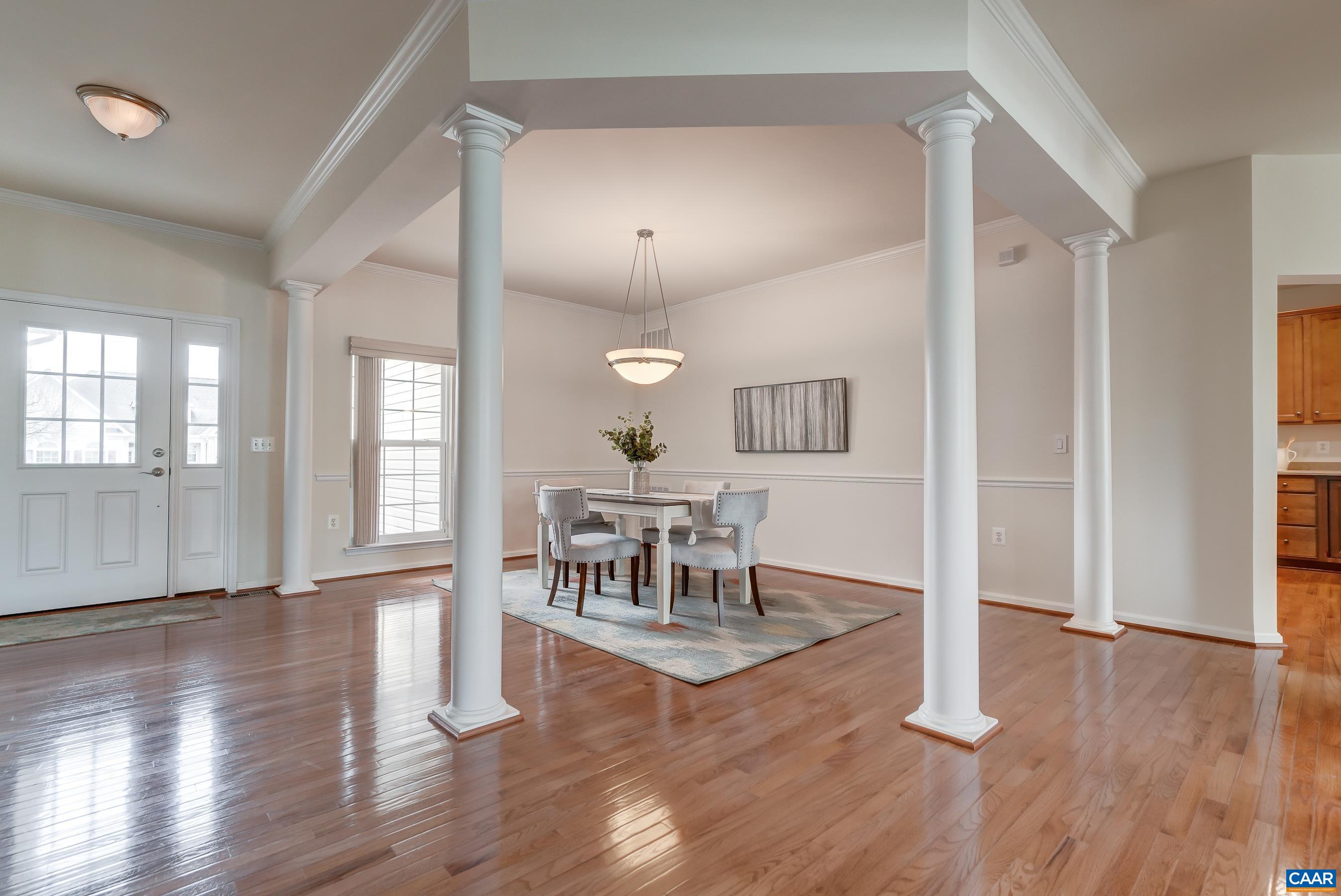 Columns offset the formal dining room.