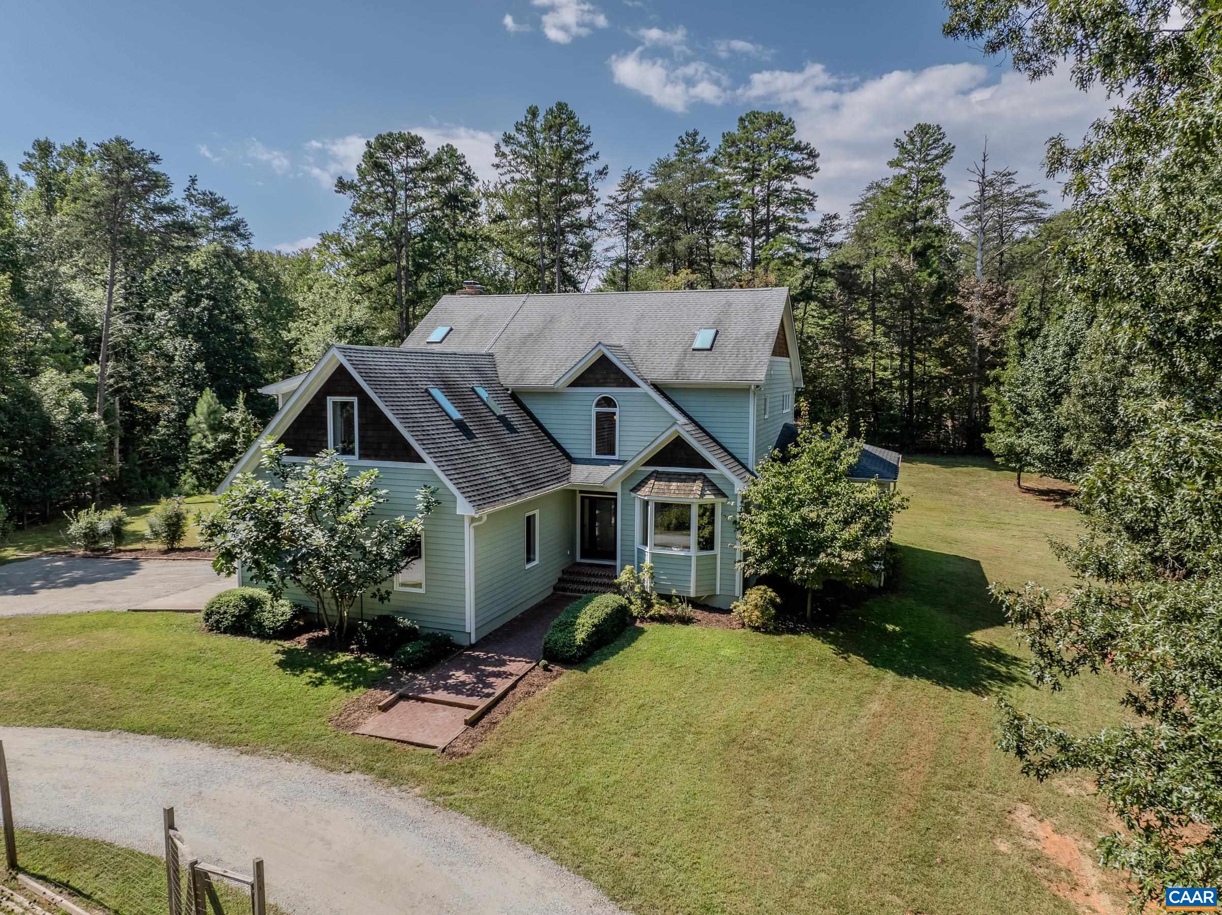 Located on 4 acres in the Murray school district this charming farmhouse home features large bedrooms, private bathrooms and great living spaces.