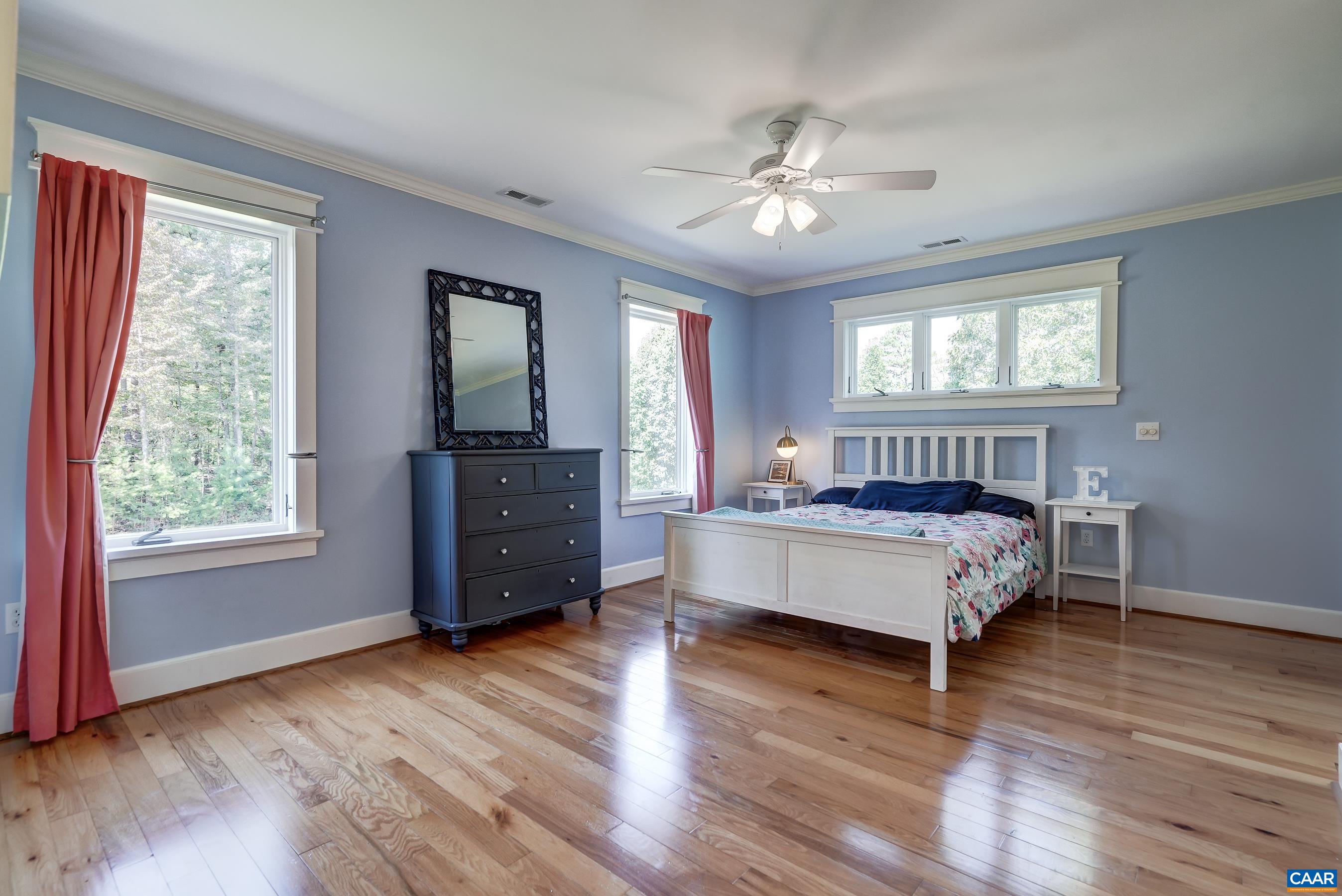 Bedroom 3 with ensuite bathroom and walk in closet.