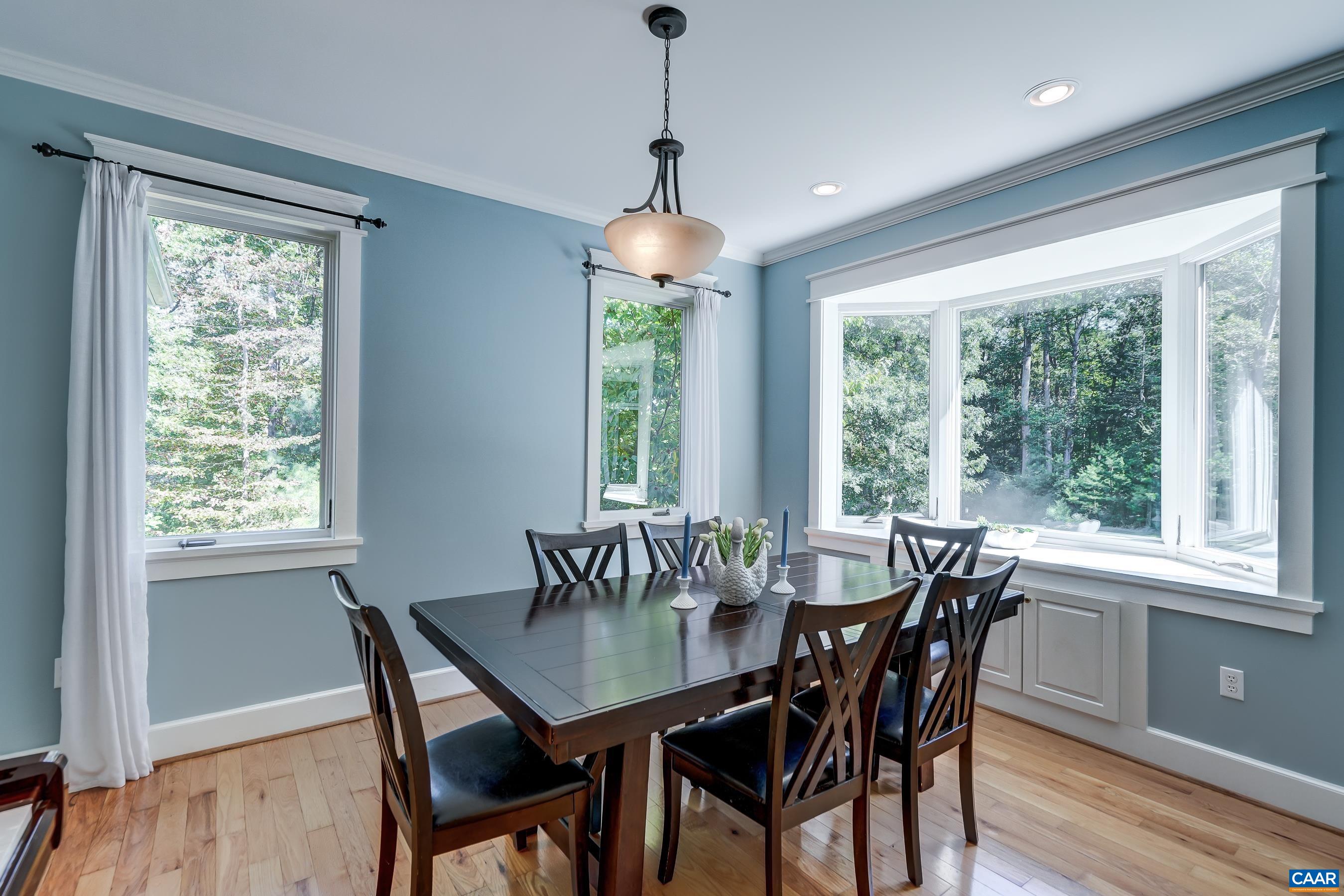 Formal dining room with large bay window is the perfect spot for holiday dining.