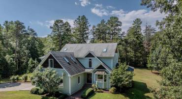 Located on 4 acres in the Murray school district this charming farmhouse home features large bedrooms, private bathrooms and great living spaces.