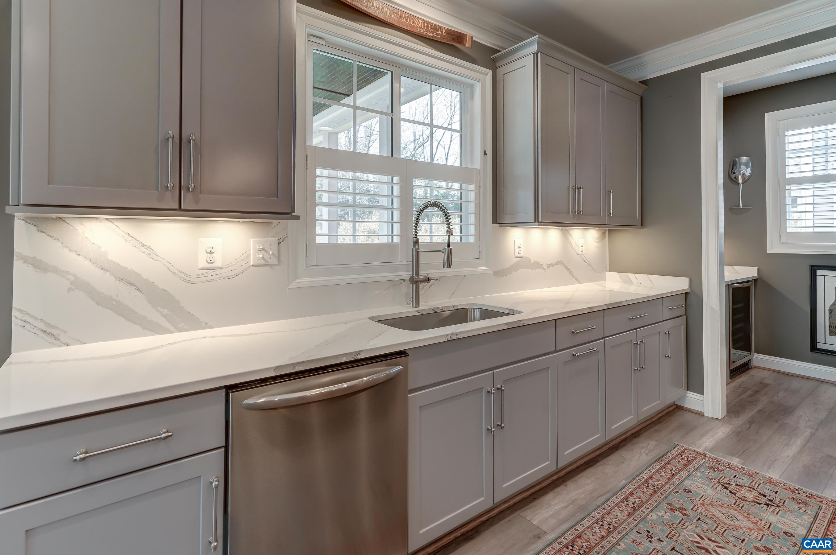 Stainless appliances including a Bosch refrigerator.