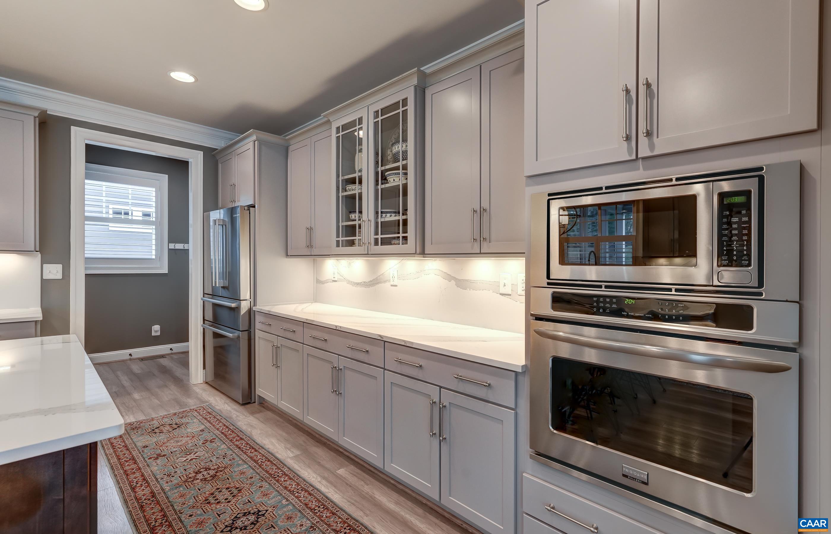 So much storage and extra USB chargers. Wall oven with microwave above too!