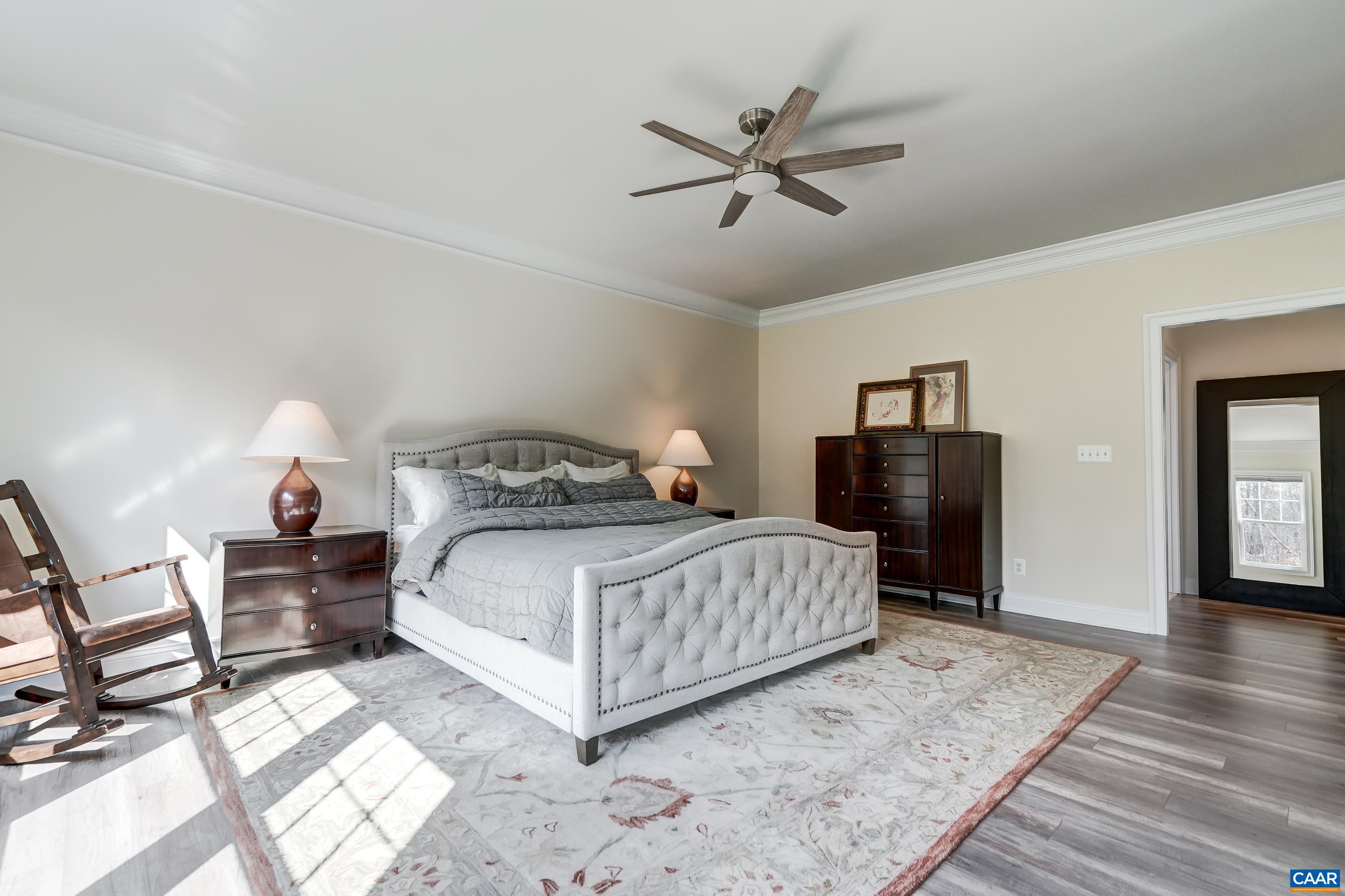 Two walk in closets and spa-like bathroom in primary suite.