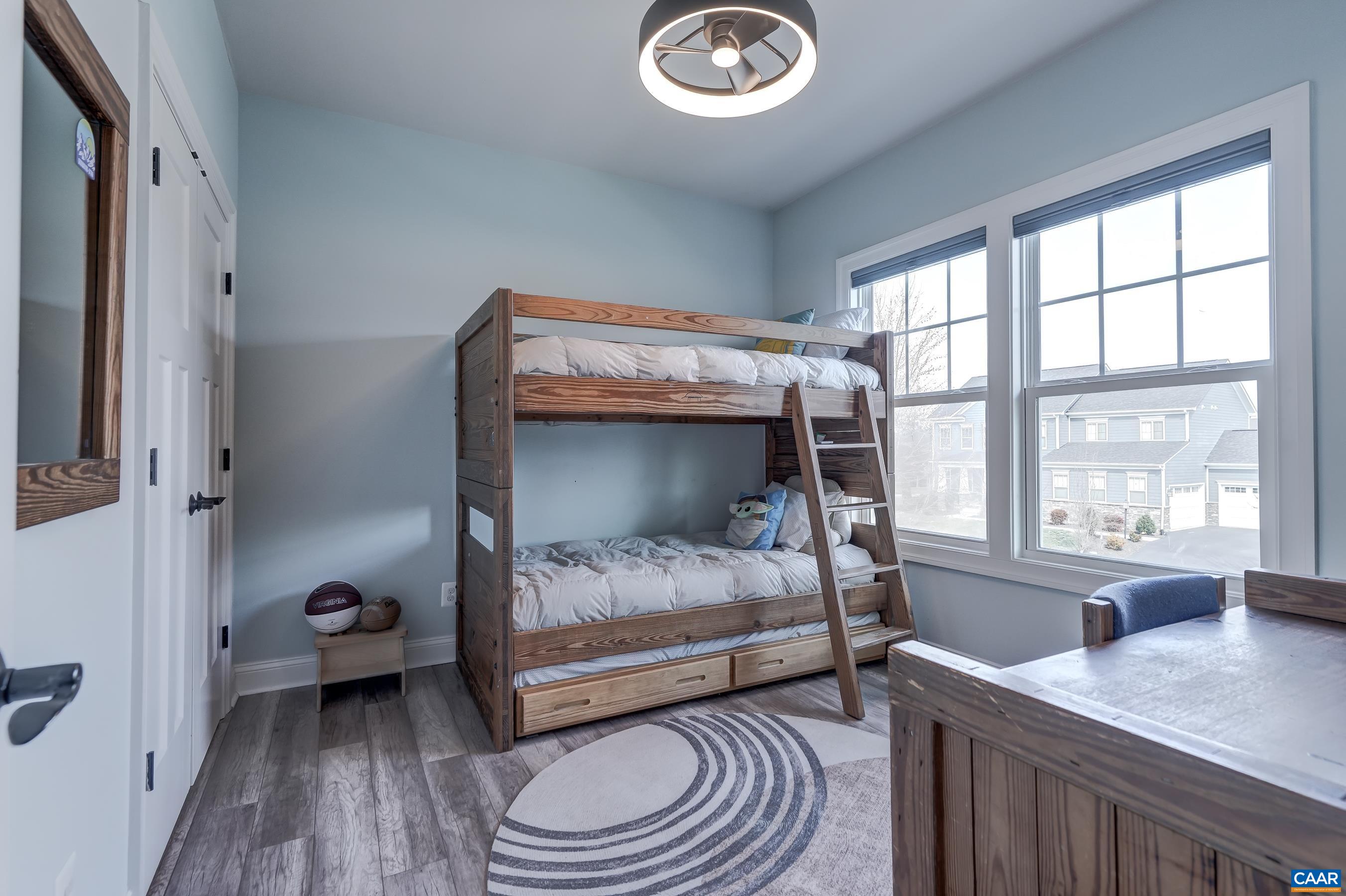 Bedroom 3 with large closet features a new modern fan/light with remote.