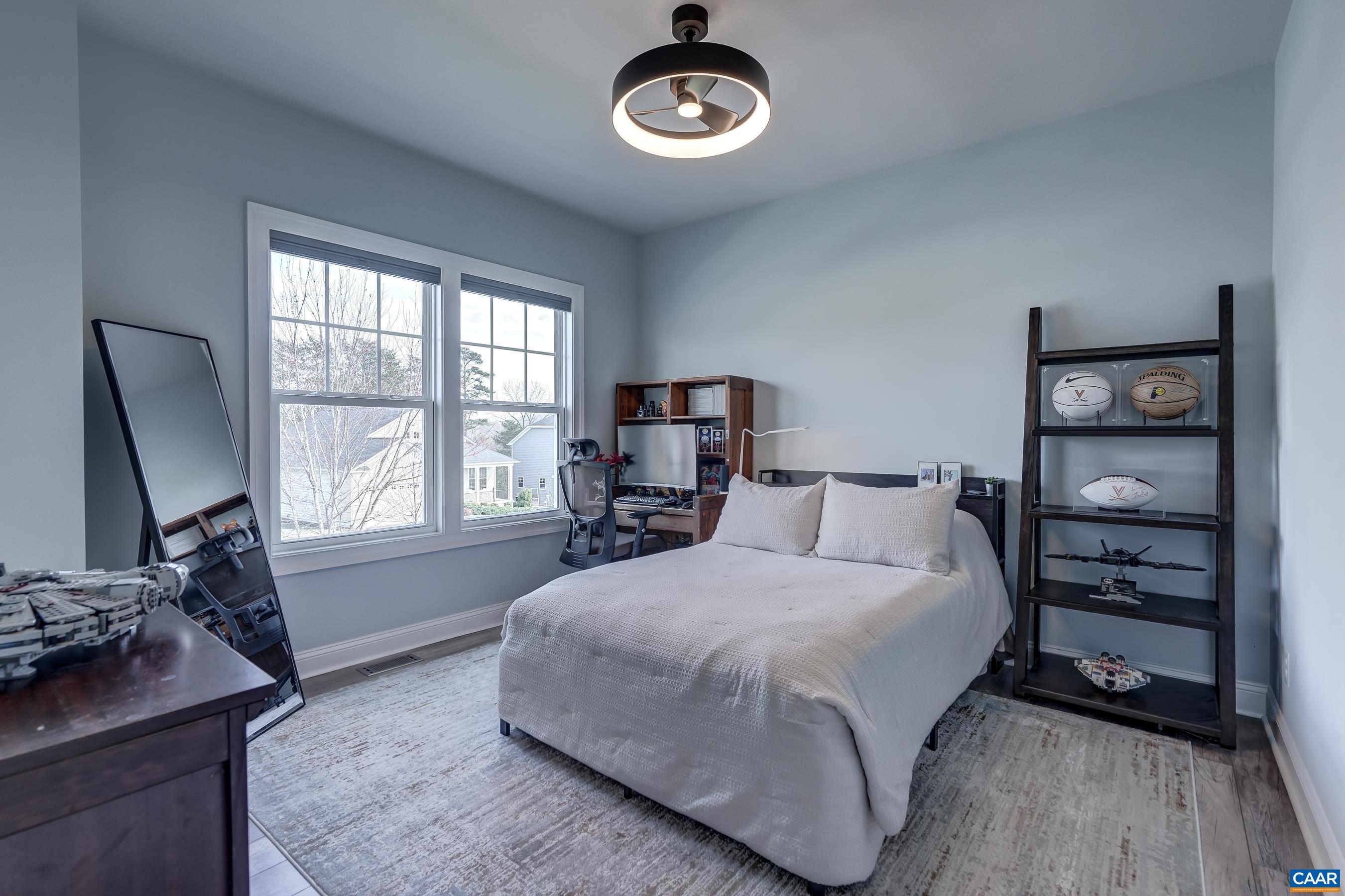 Bedroom 4 with large closet features a new modern fan/light with remote.