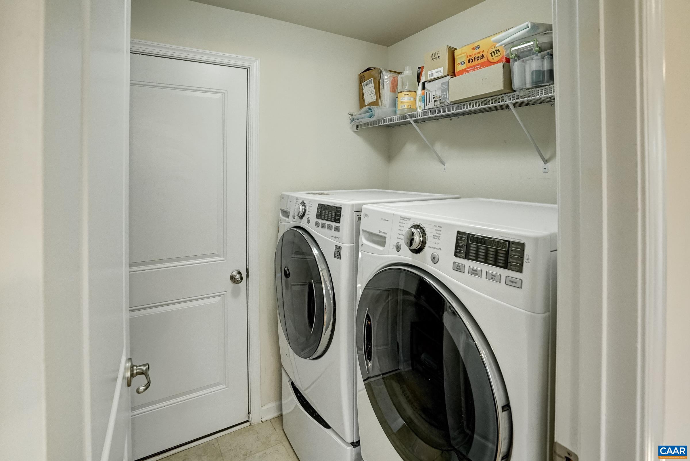 Main level laundry/mudroom with washer/dryer.