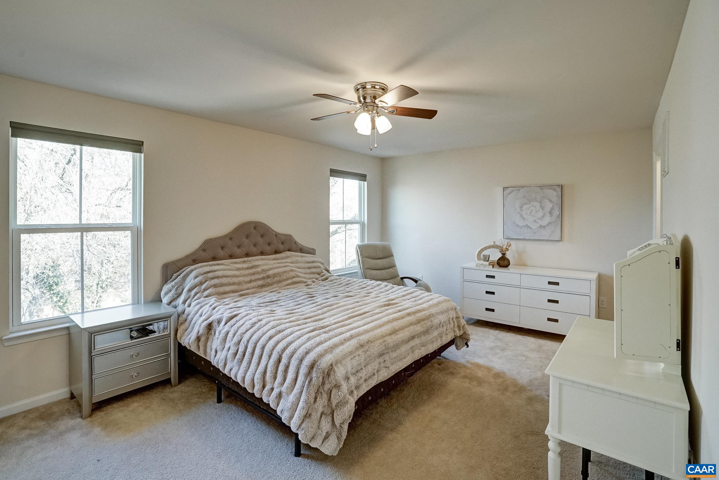 Second floor primary suite features a walk in closet and private bathroom.