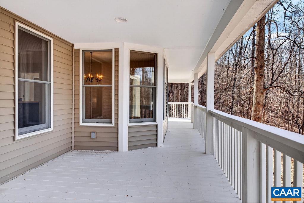 The rear porch spans across the whole back side of the house