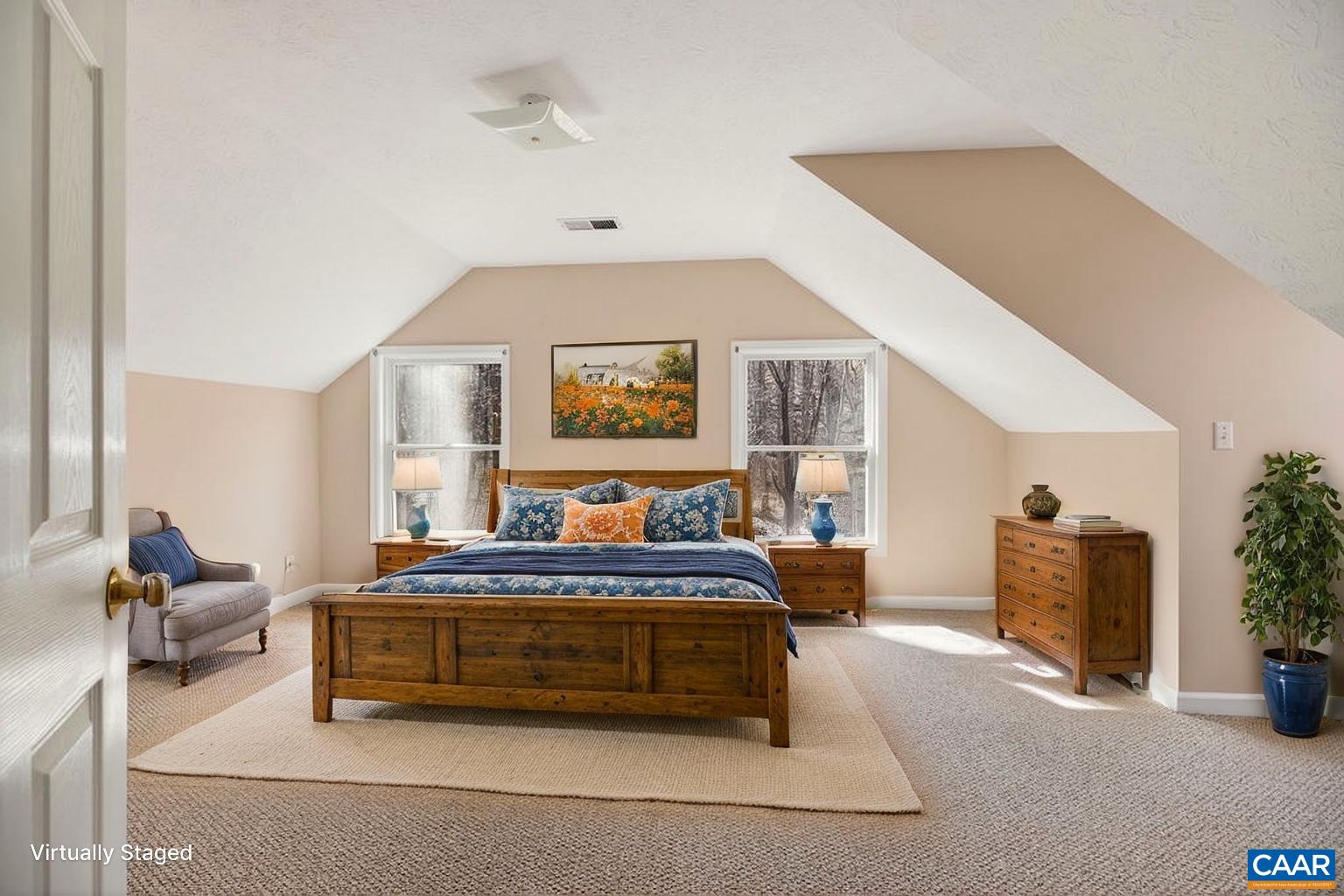 One of the two very spacious guest bedrooms upstairs