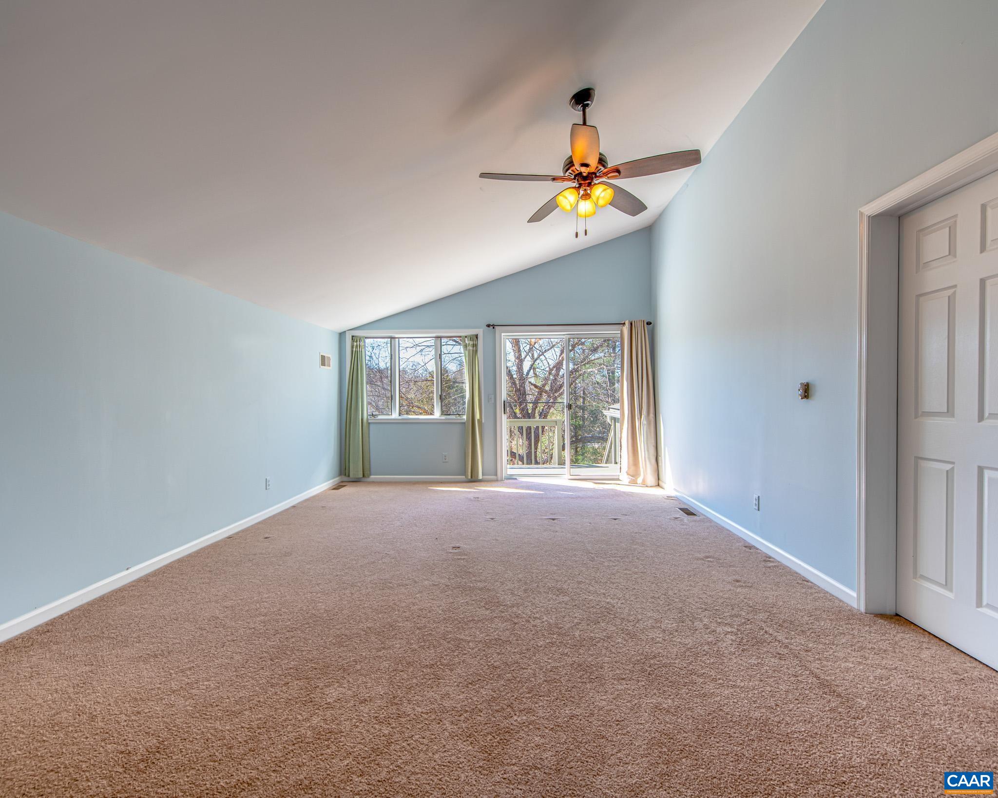 Private Primary Suite with Sitting Area, Cathedral Ceiling, Access to Private Deck (freshly Painted)