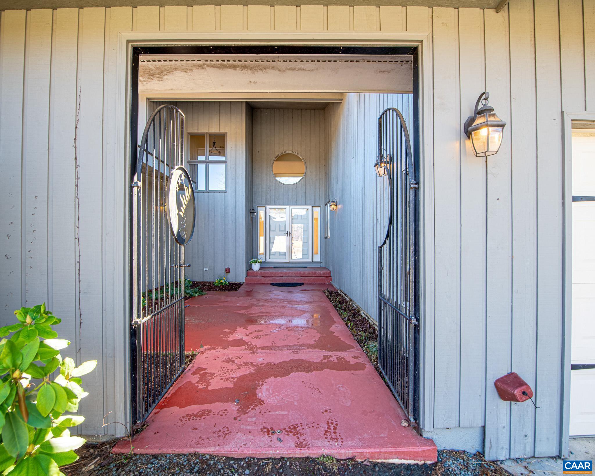 Custom Hewn Cast-Iron Entry Doors