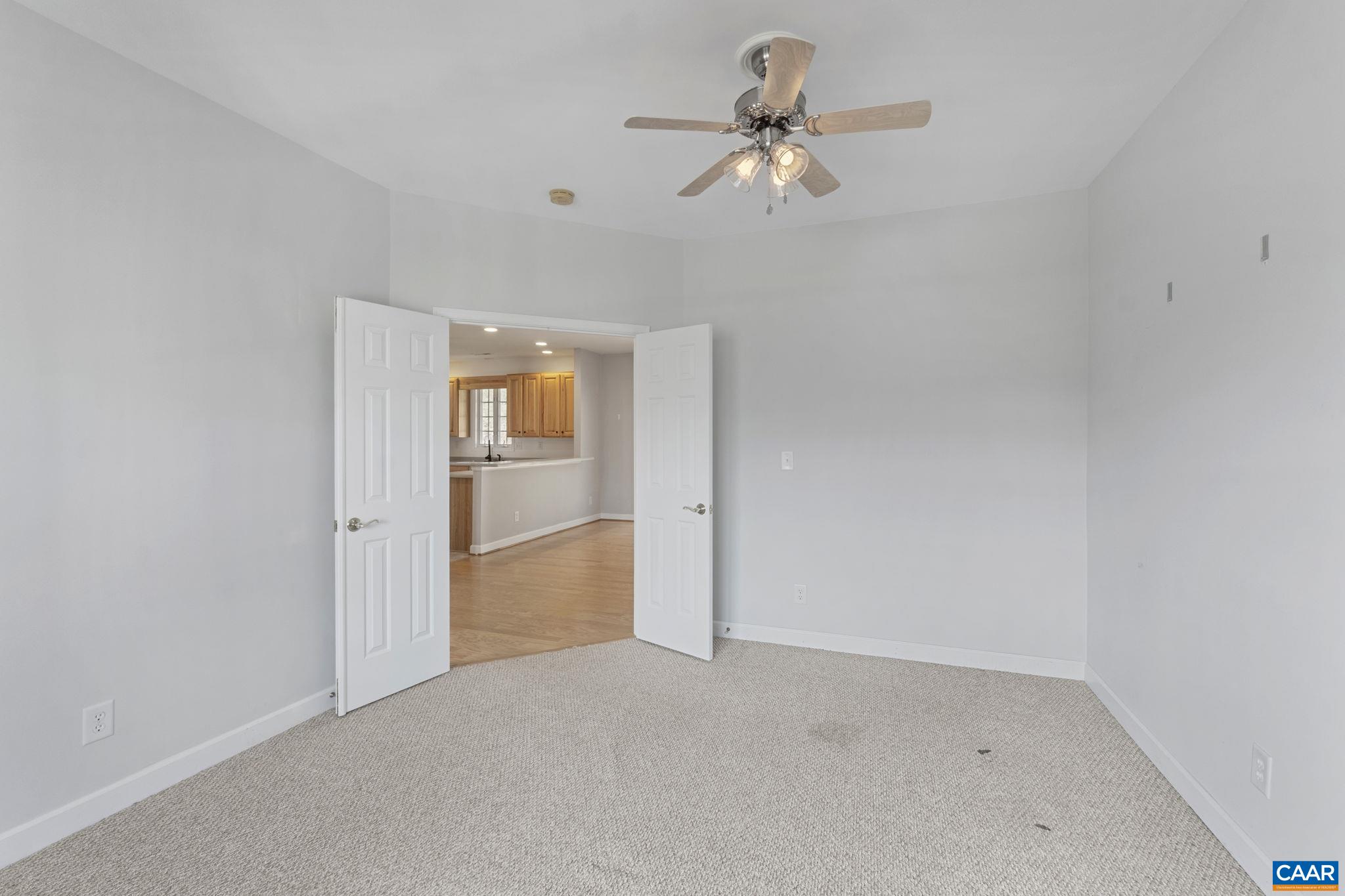 Front bedroom with double doors.