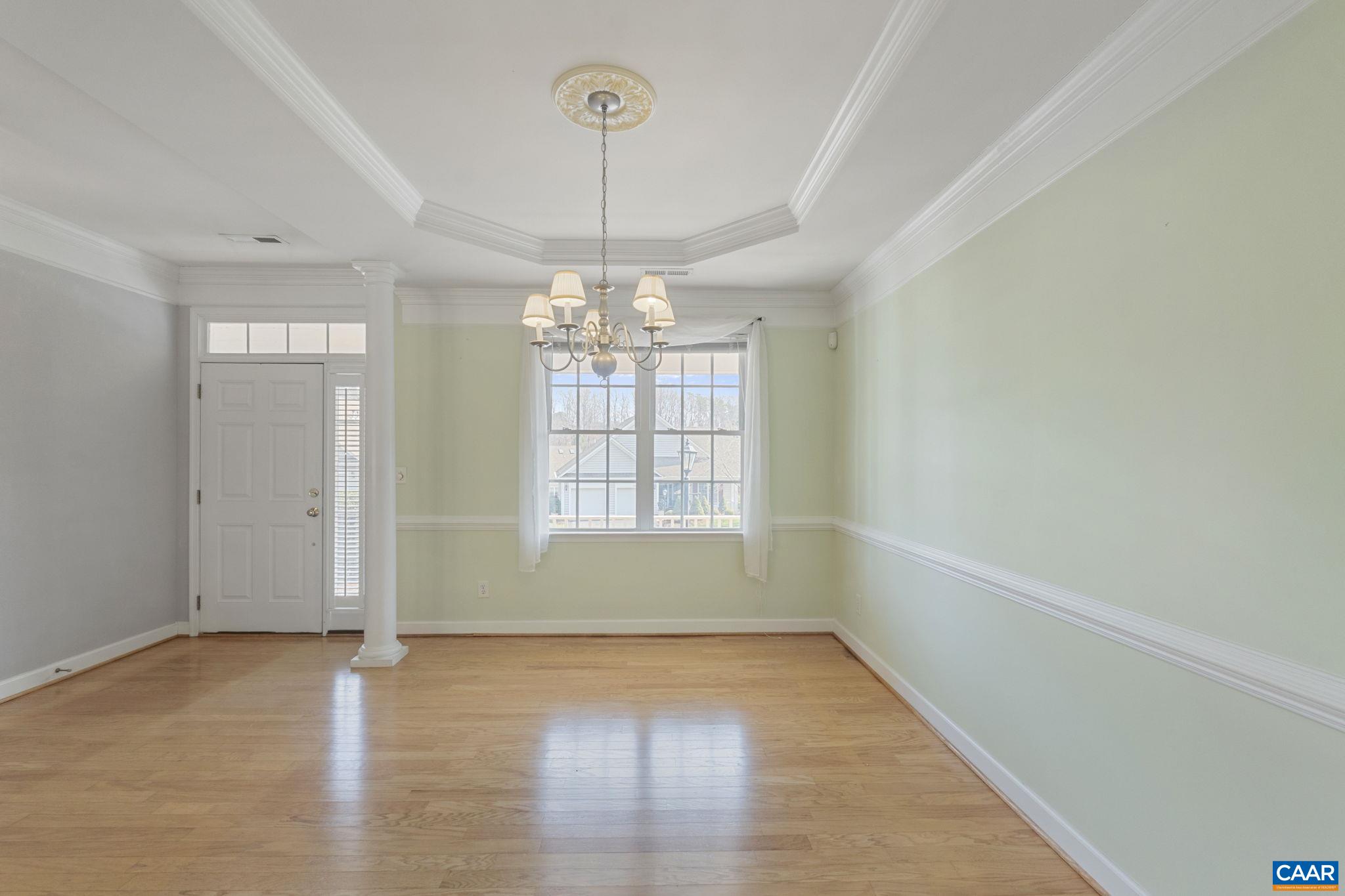 Dining room and front foyer off the kitchen.