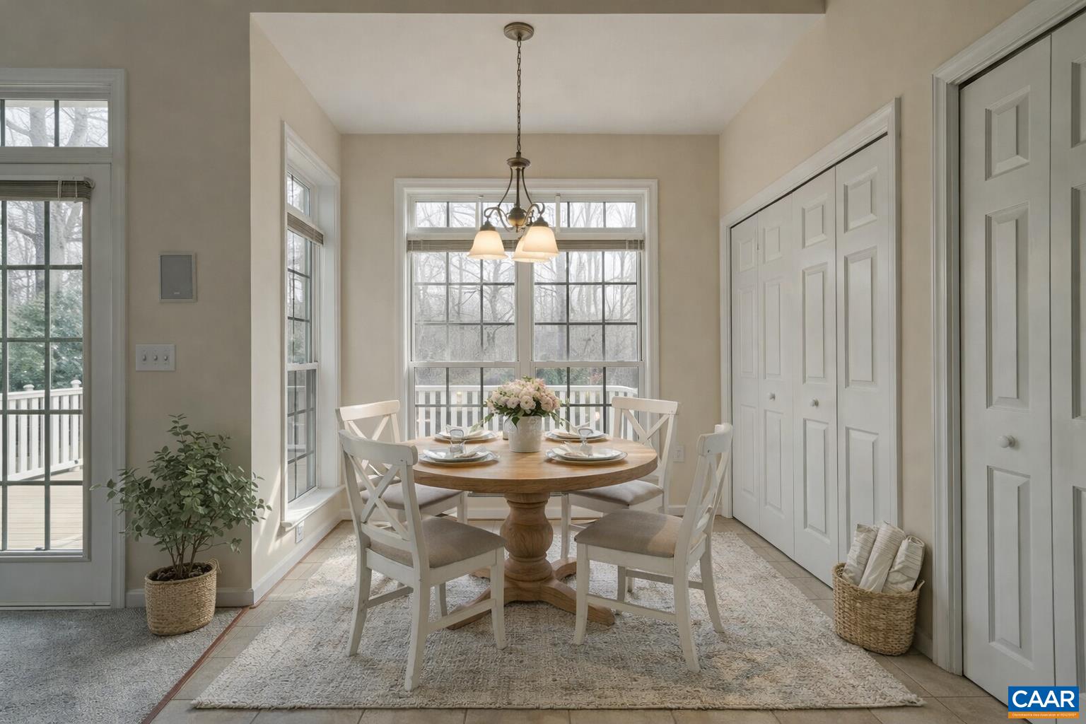 Breakfast area overlooking stone patio below.