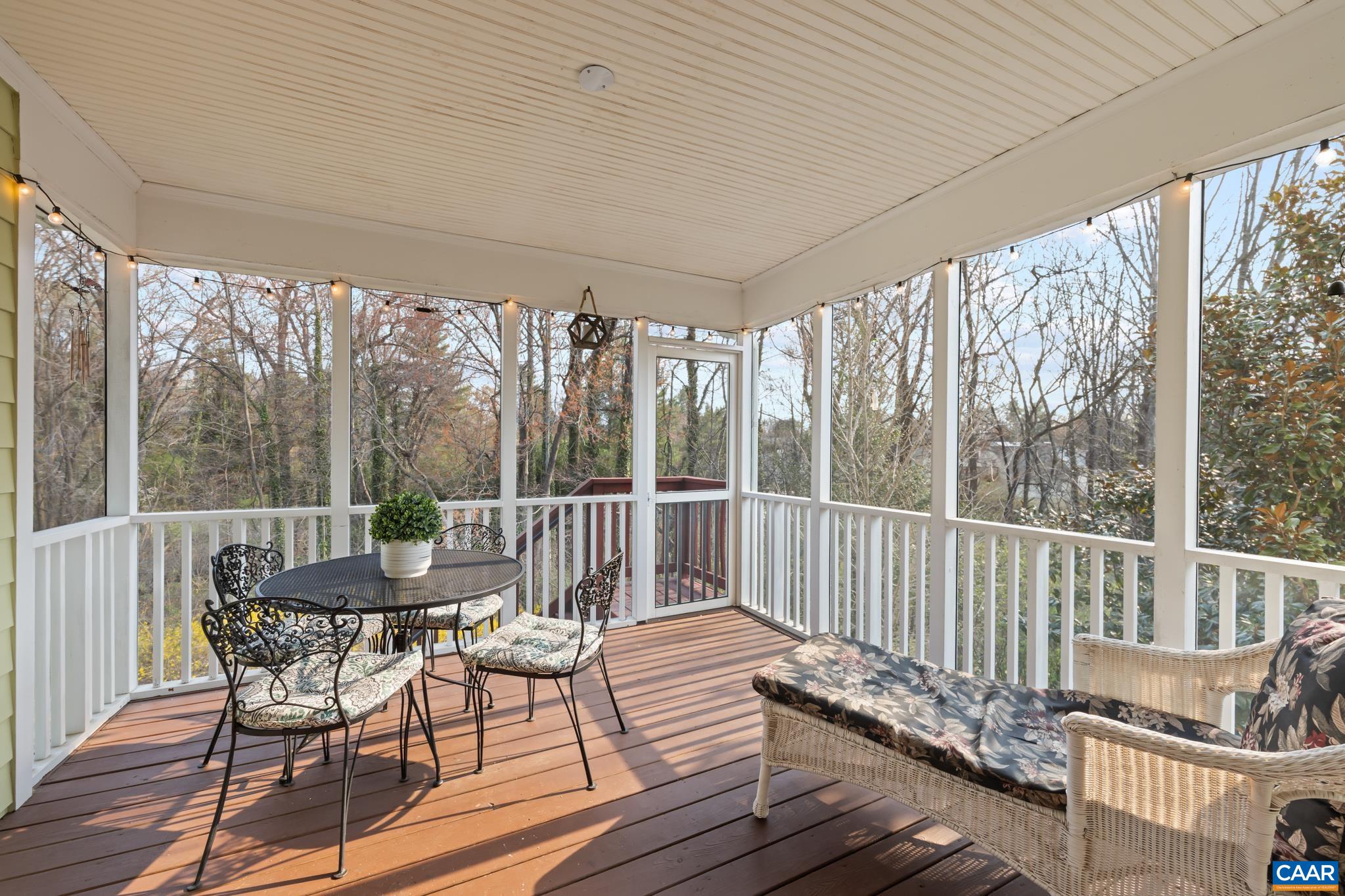 Enjoy bug-free outdoor dining on the screened-in porch located just off the main living area.
