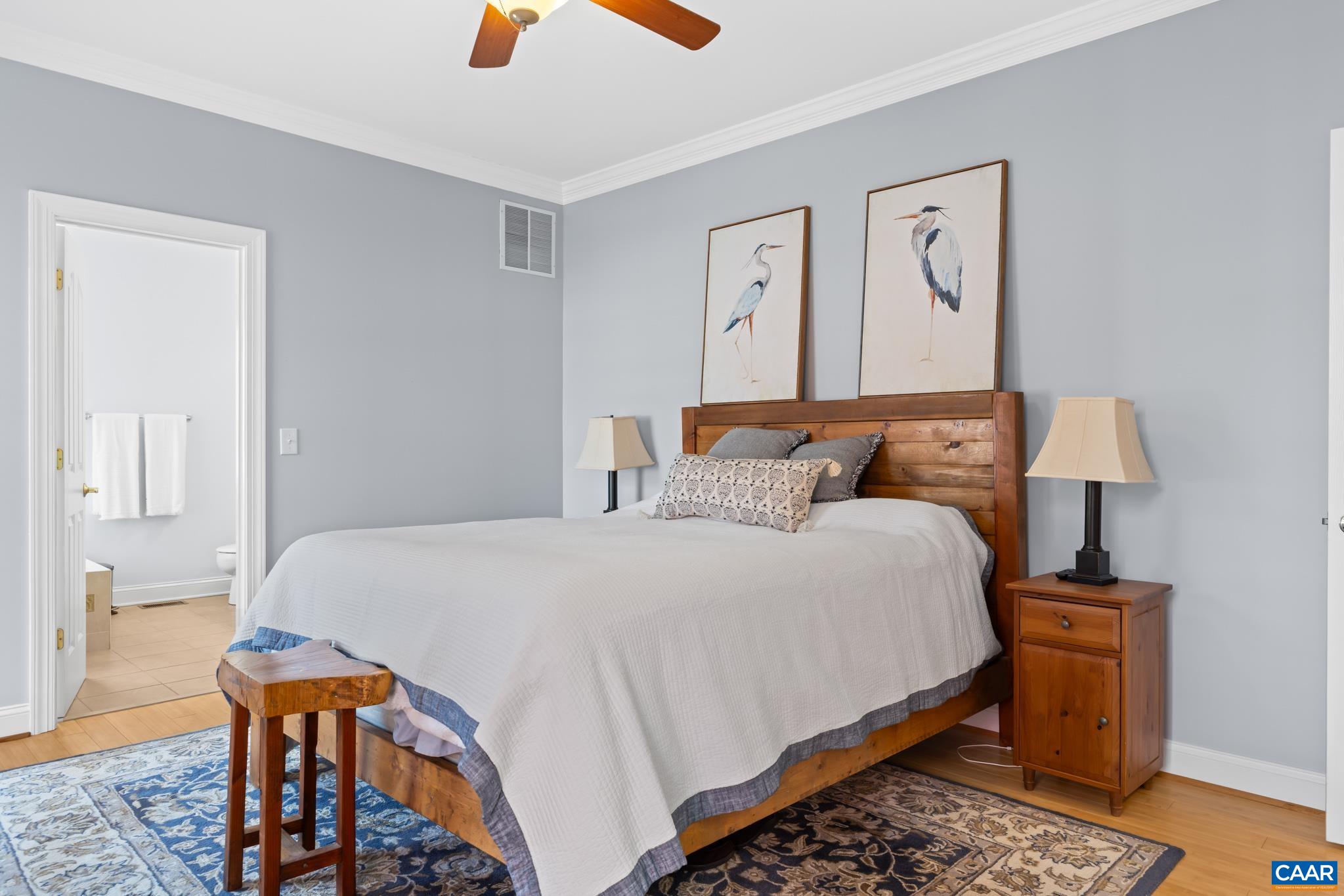 Convenient first-floor primary suite featuring a large walk-in closet and private bath.