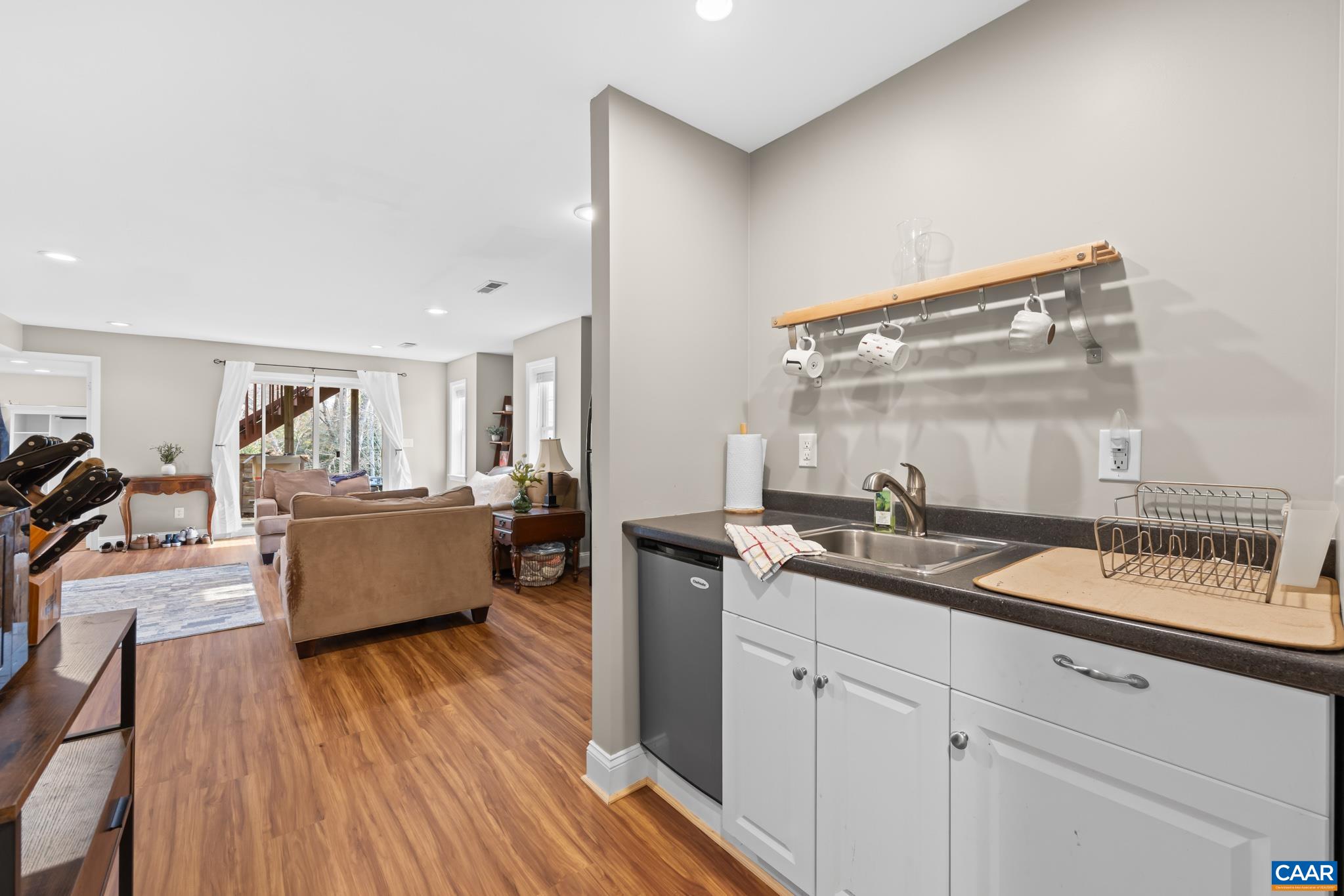 The fully finished walk-out basement serves as a complete in-law or teenager suite with a large family room