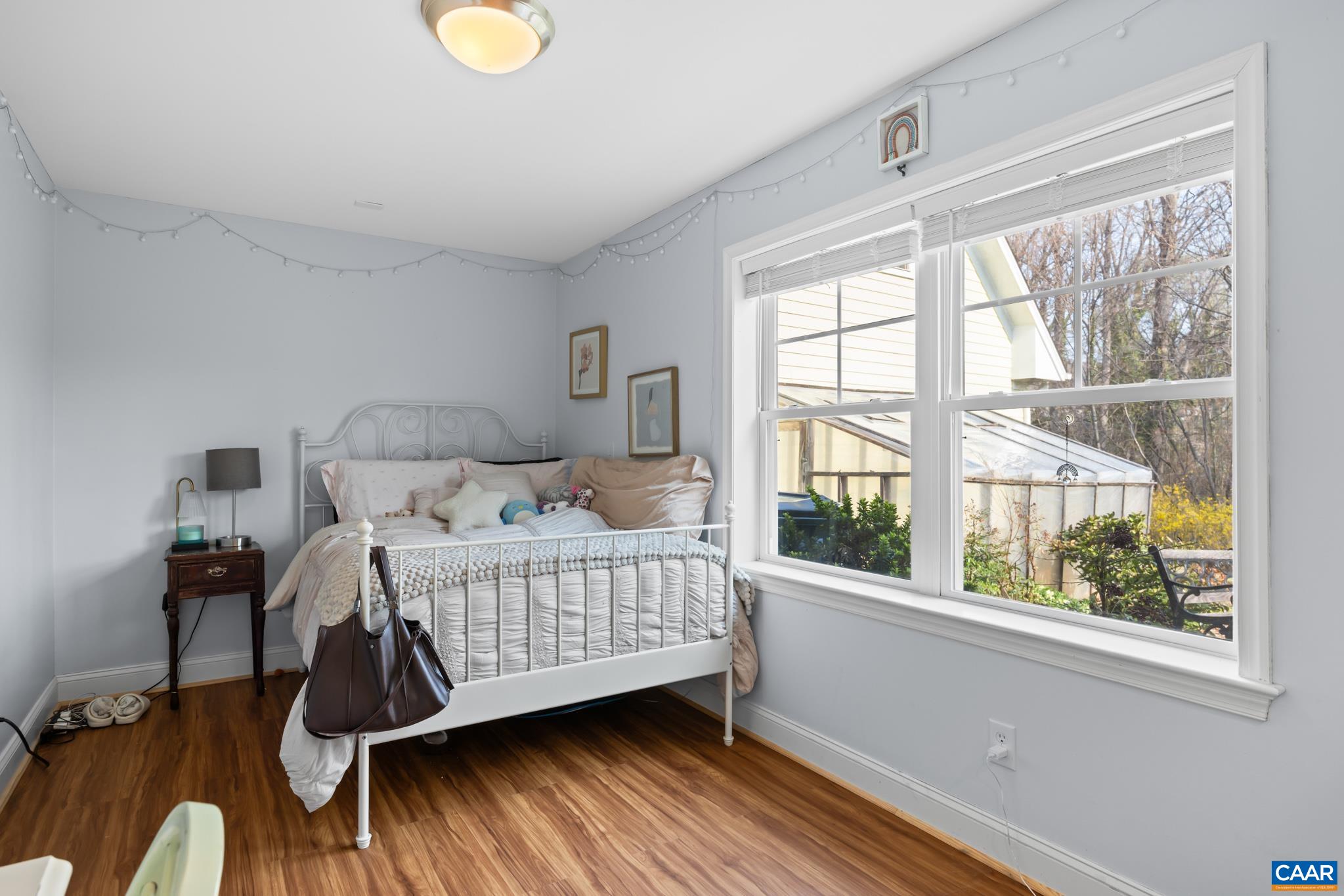 A private 5th bedroom located in the basement adjacent to a full bathroom.