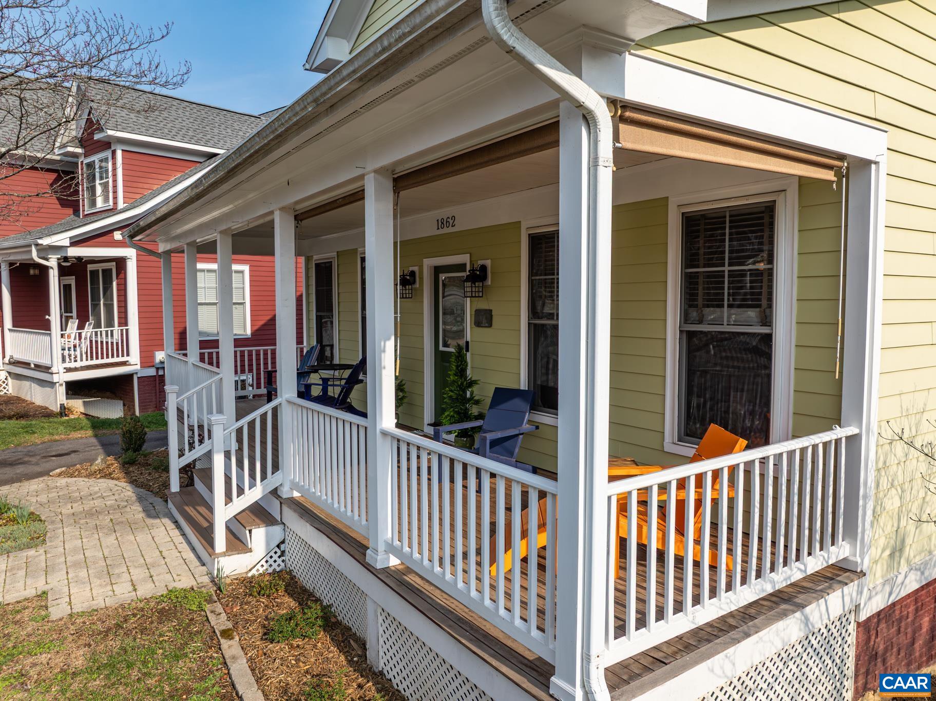 Relax on the spacious porch overlooking the quiet, sidewalk-lined streets of Waylands Grant.