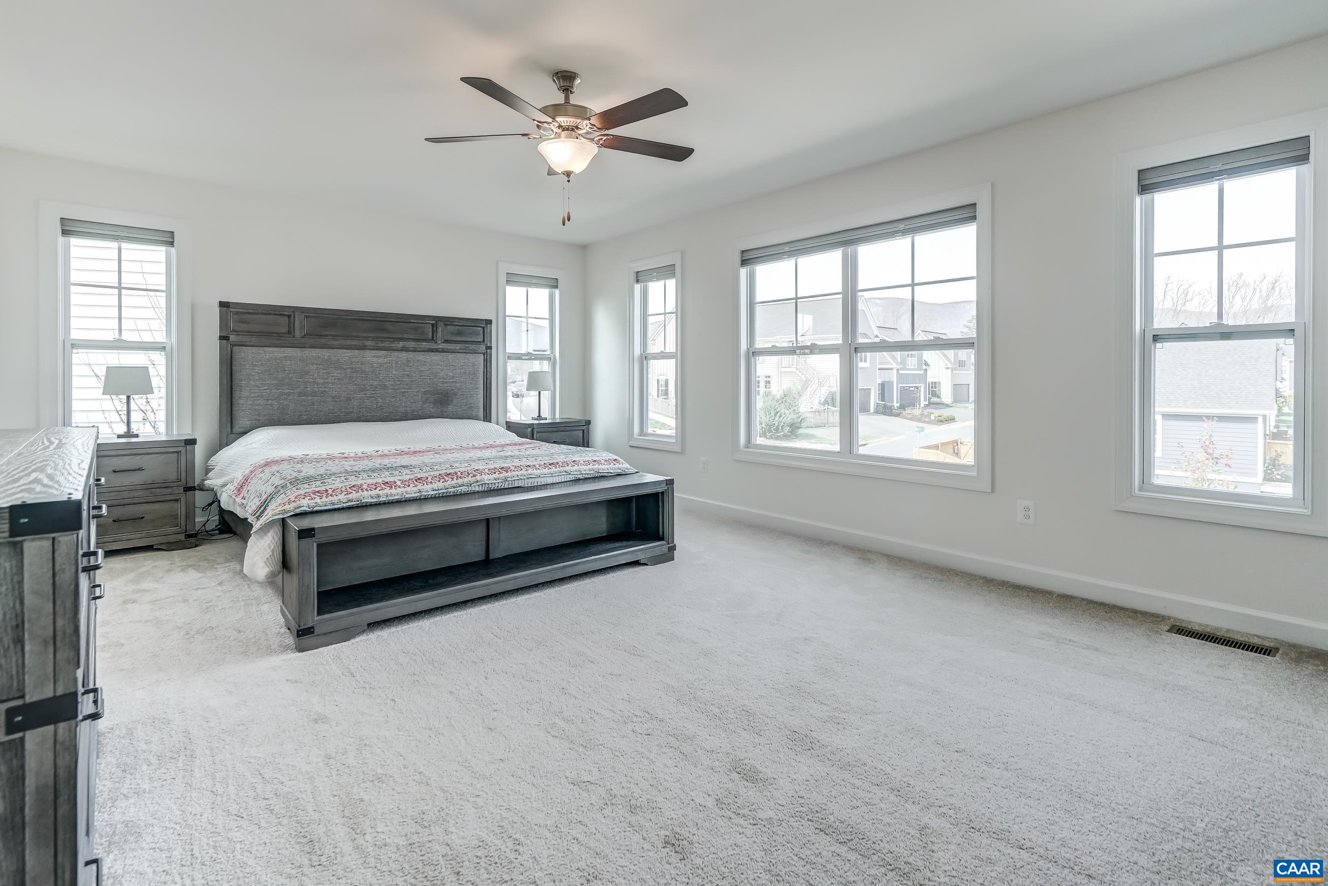 Second floor primary suite features two walk-in closets, and a private ensuite bathroom.