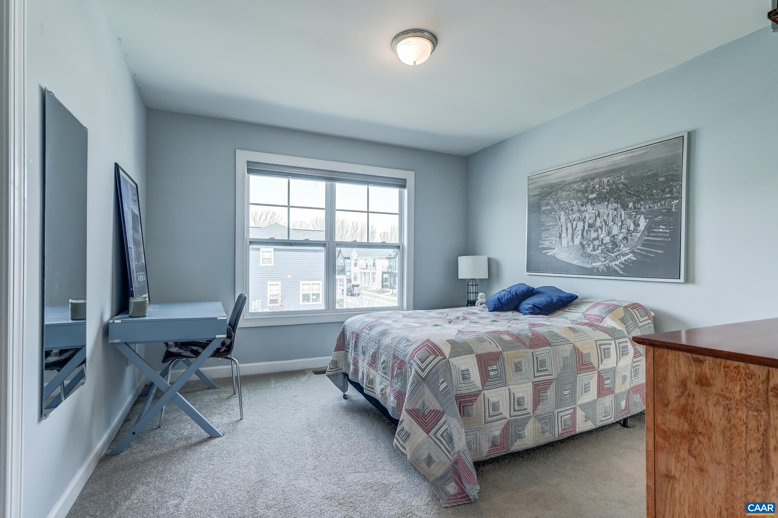 Bedroom 3 features a large walk in closet and shares a jack and jill bathroom.