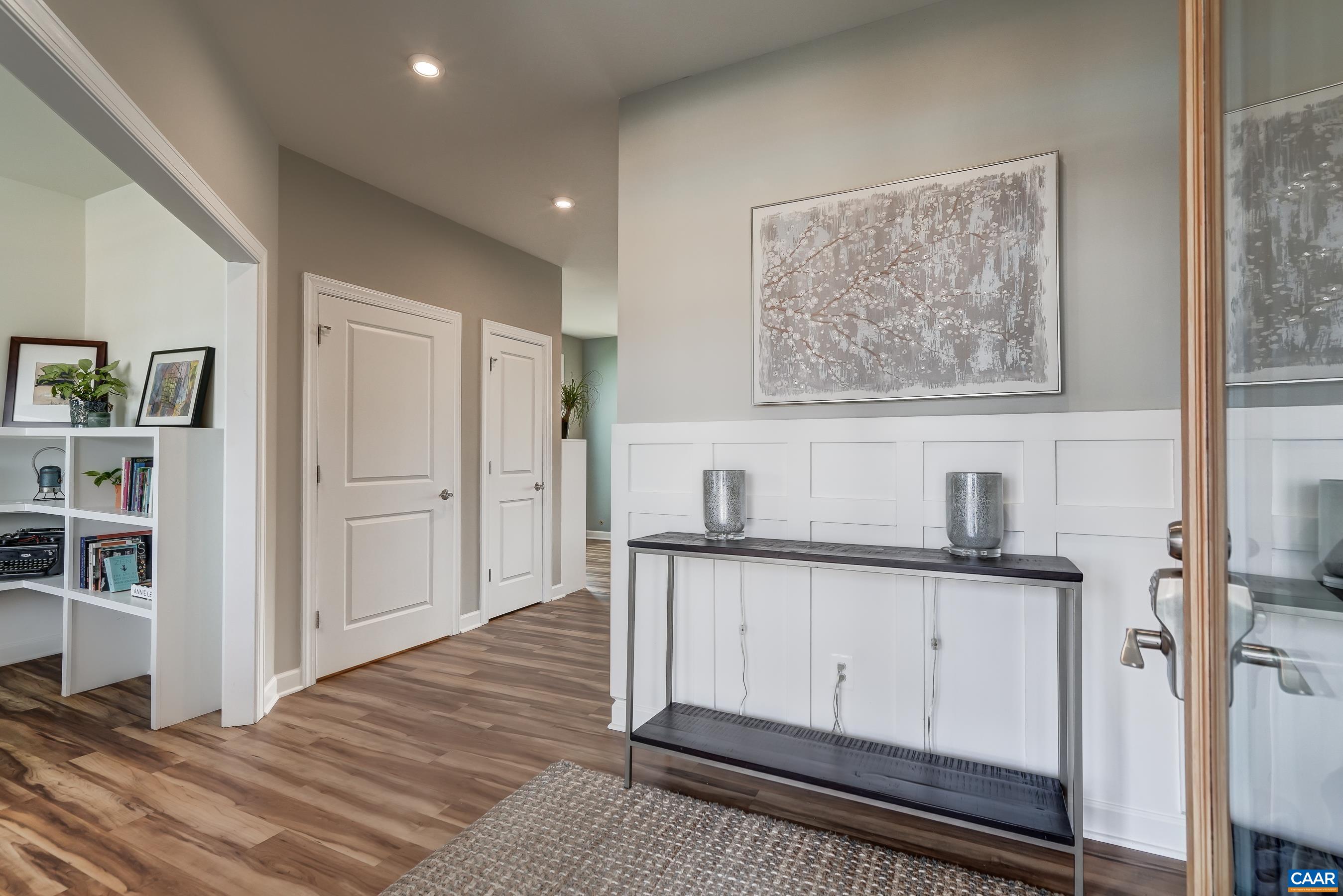 Engineered hardwood floors throughout the main level in this beautifully maintained home.