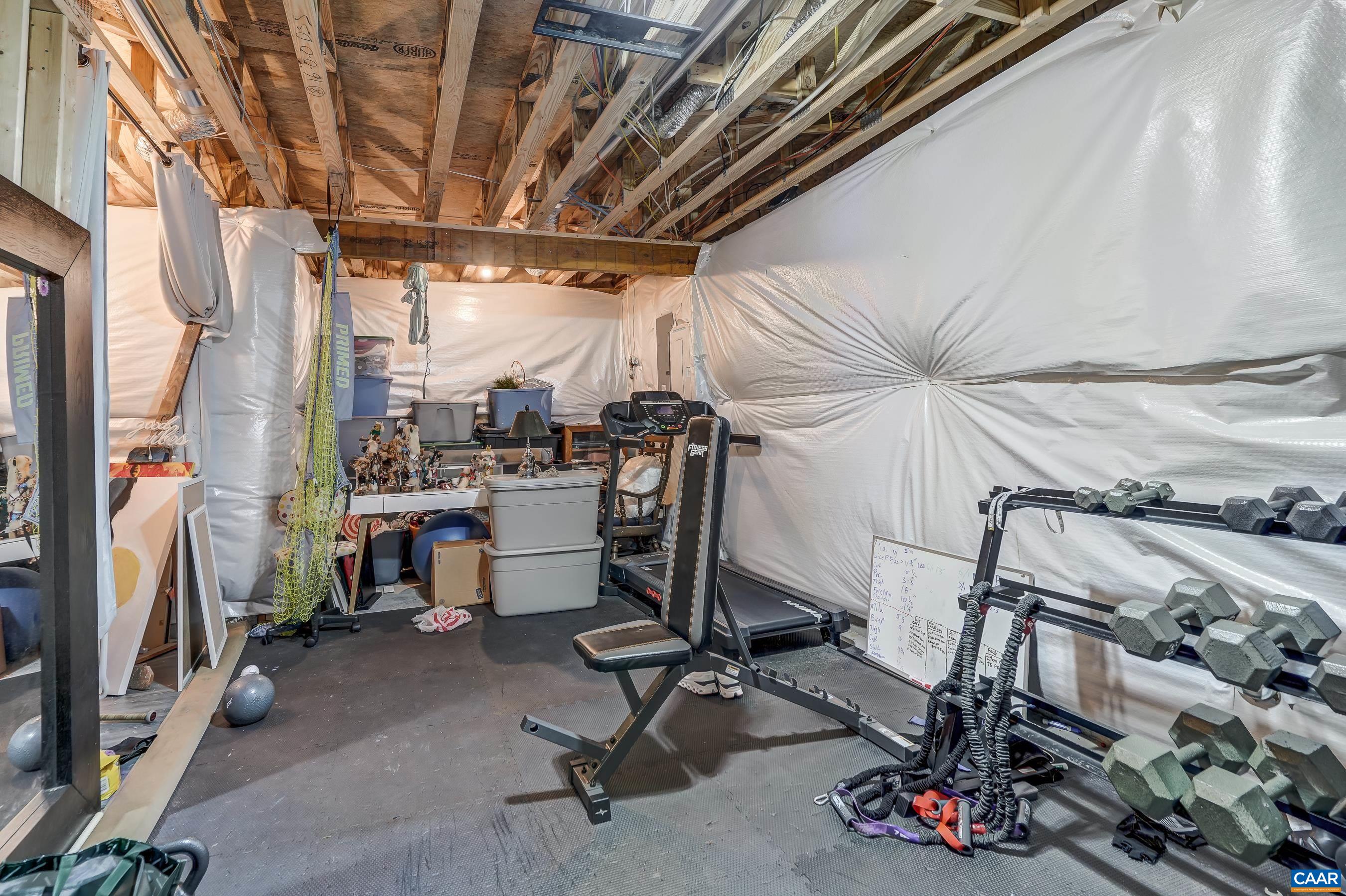 Unfinished area could be a work out room.
