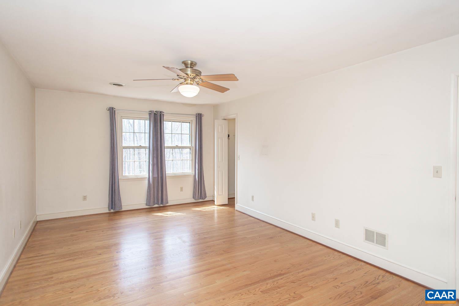 Spacious primary suite with 2 closets.