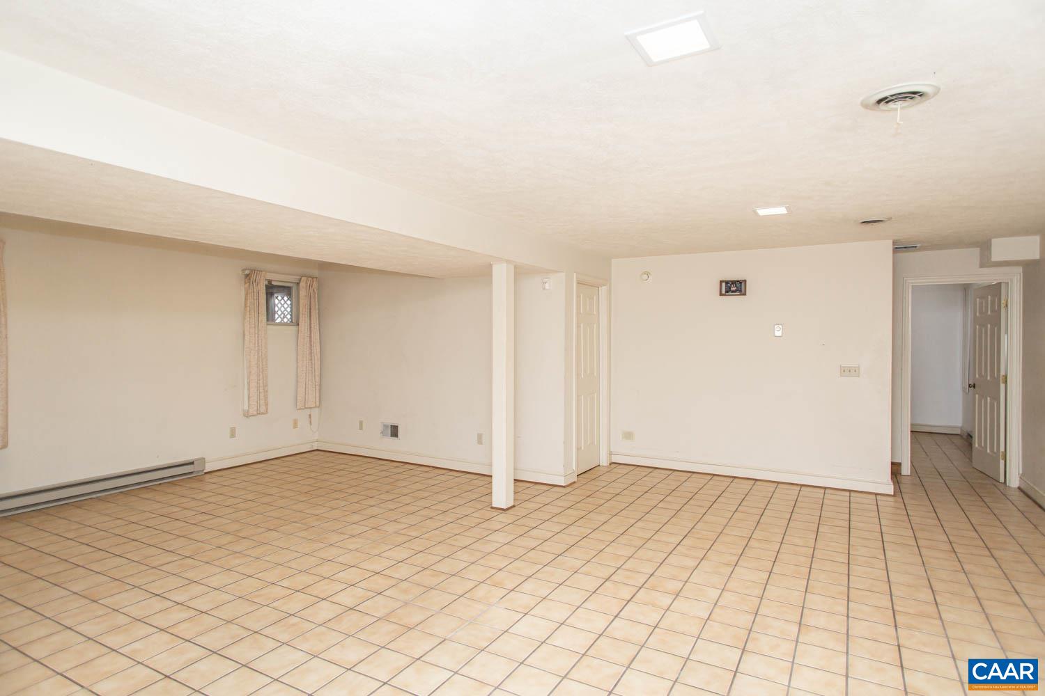 Plenty of space for entertainment, game room, or play room.