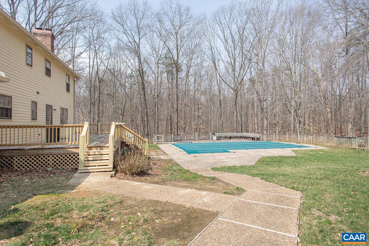 In-ground pool in the backyard.