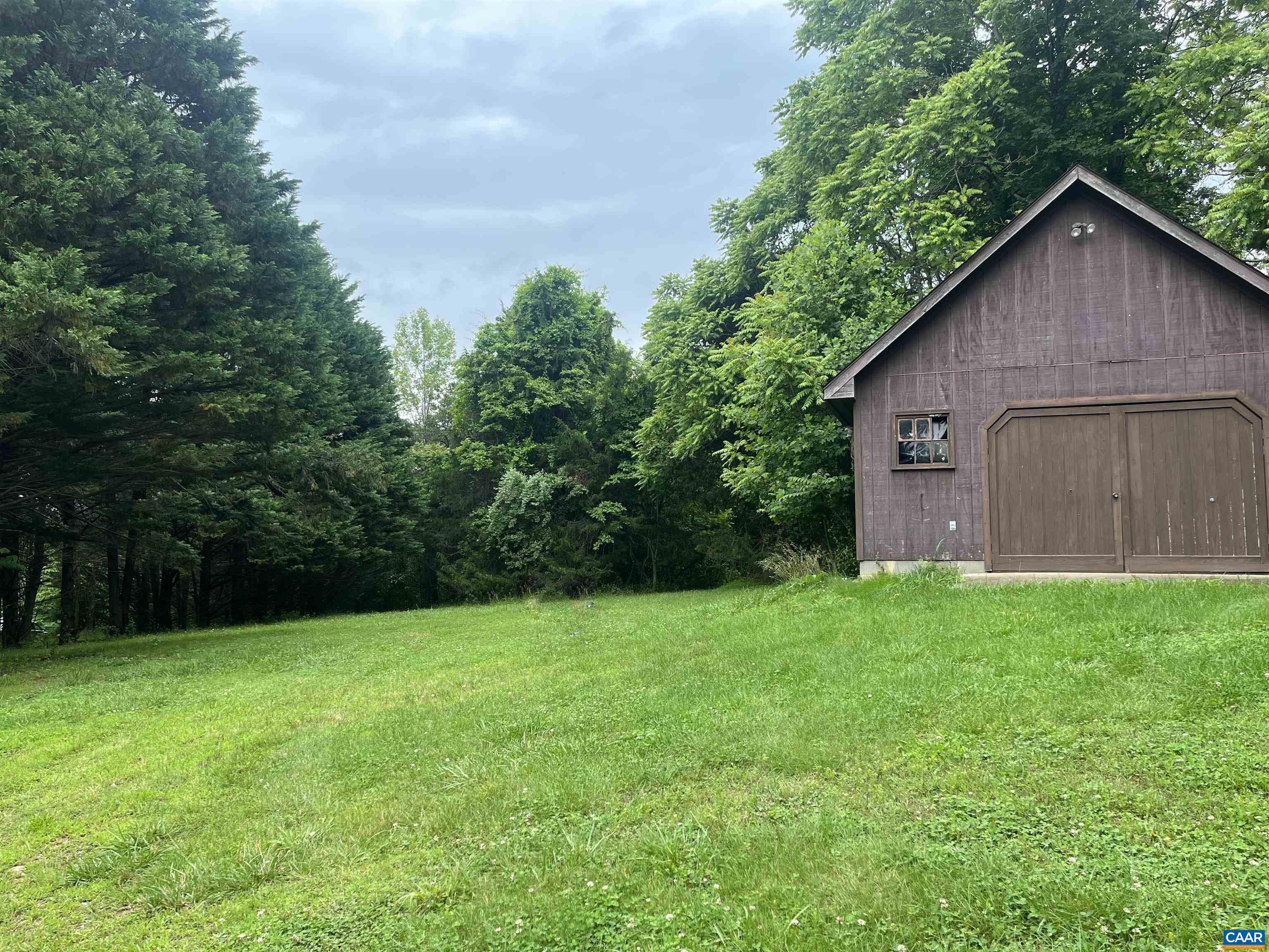 Parcel begins just past the shop.