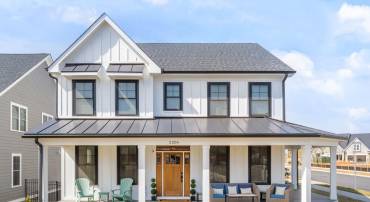 Welcome to this modern farmhouse on a corner lot in the Belvedere neighborhood