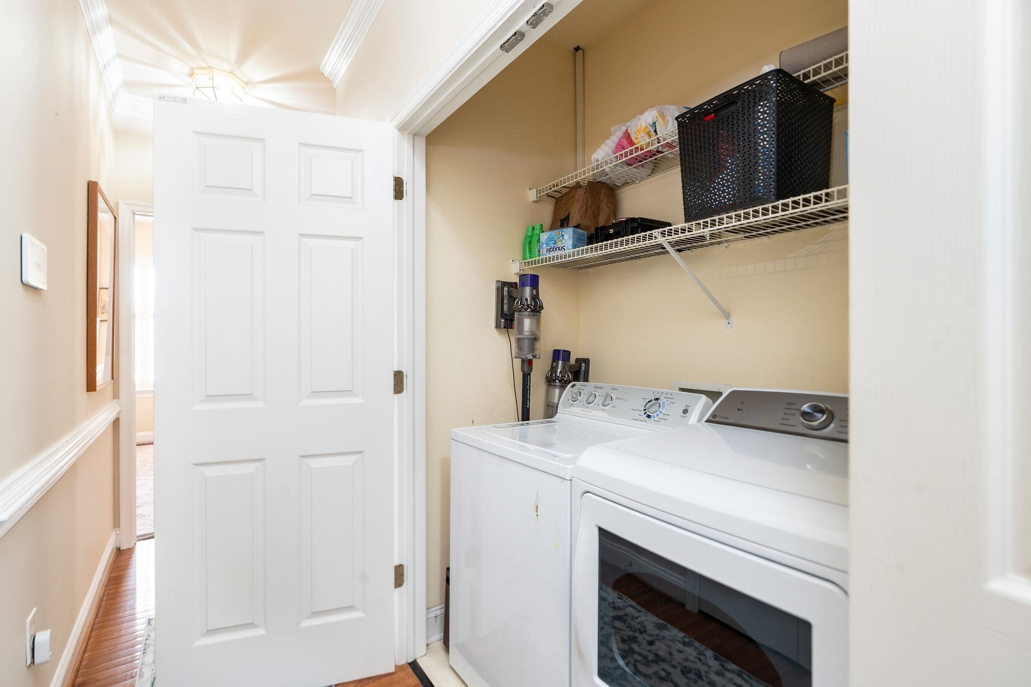 Conveniently located in the hall, across from linen closet.