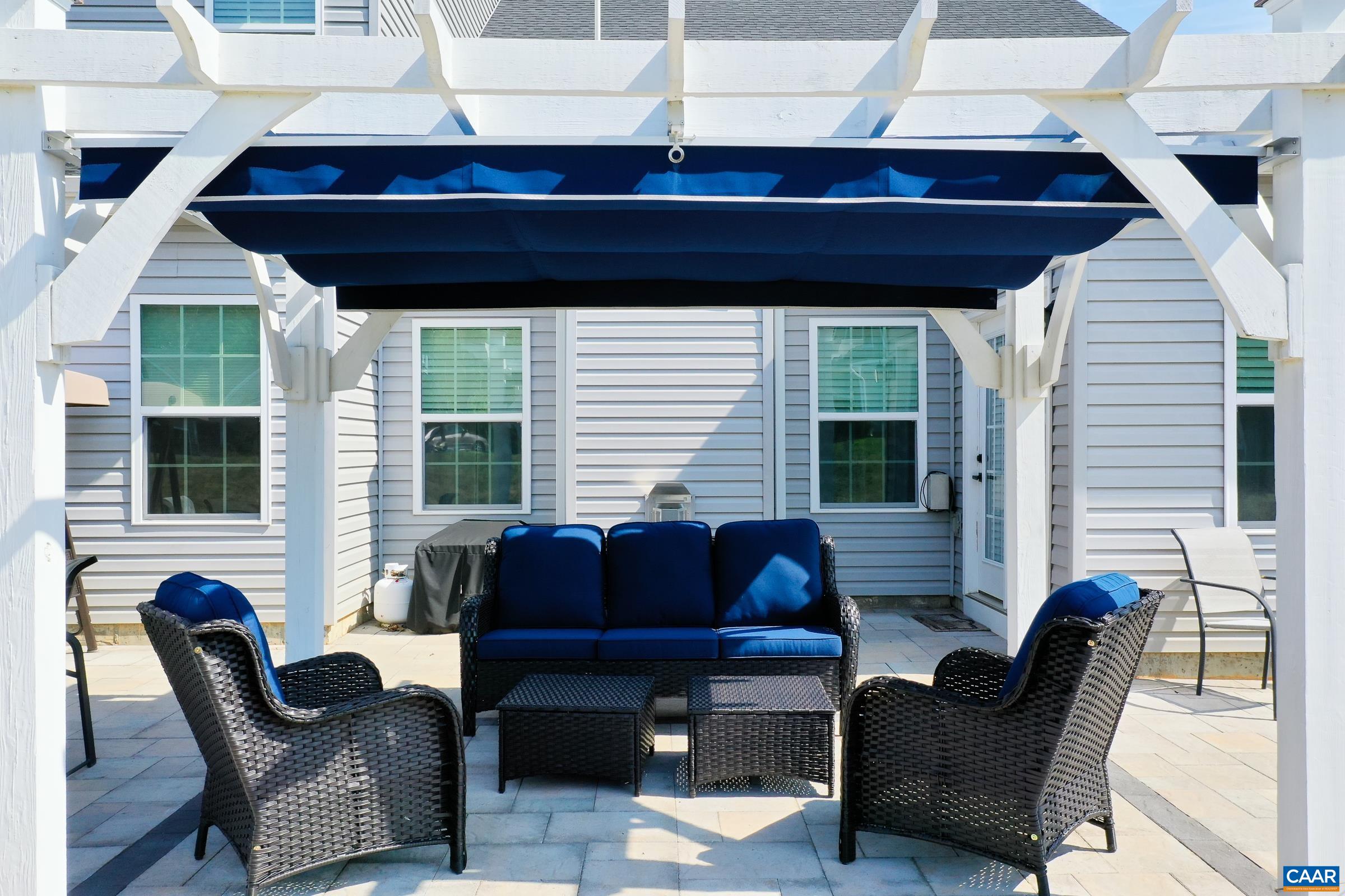 Pergola with retractable awning for shade on hot summer days. Pergola with retractable awning for shade on hot summer days.
