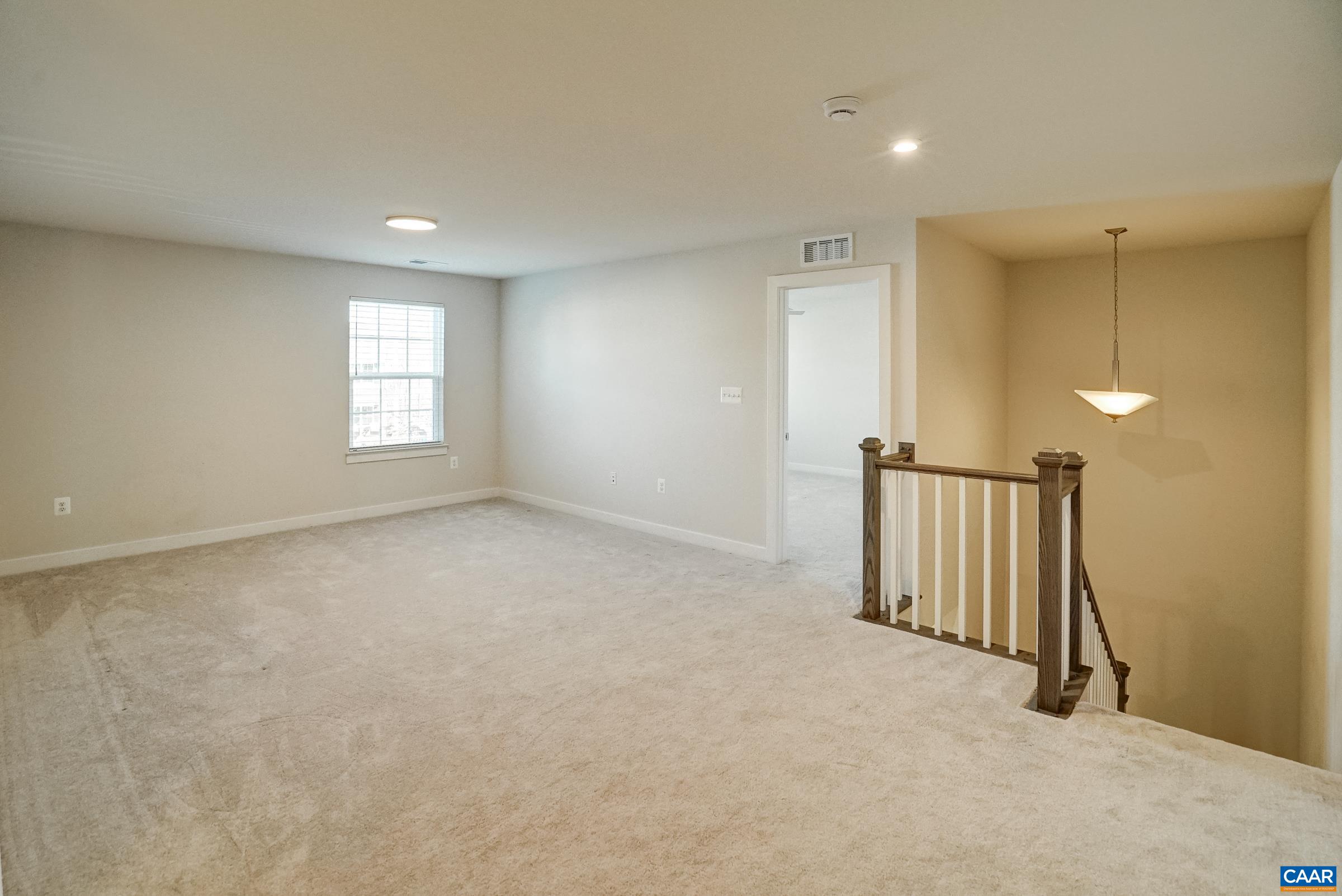 Second floor features a large loft space - perfect for a playroom or media room. Second floor features a large loft space - perfect for a playroom or media room.