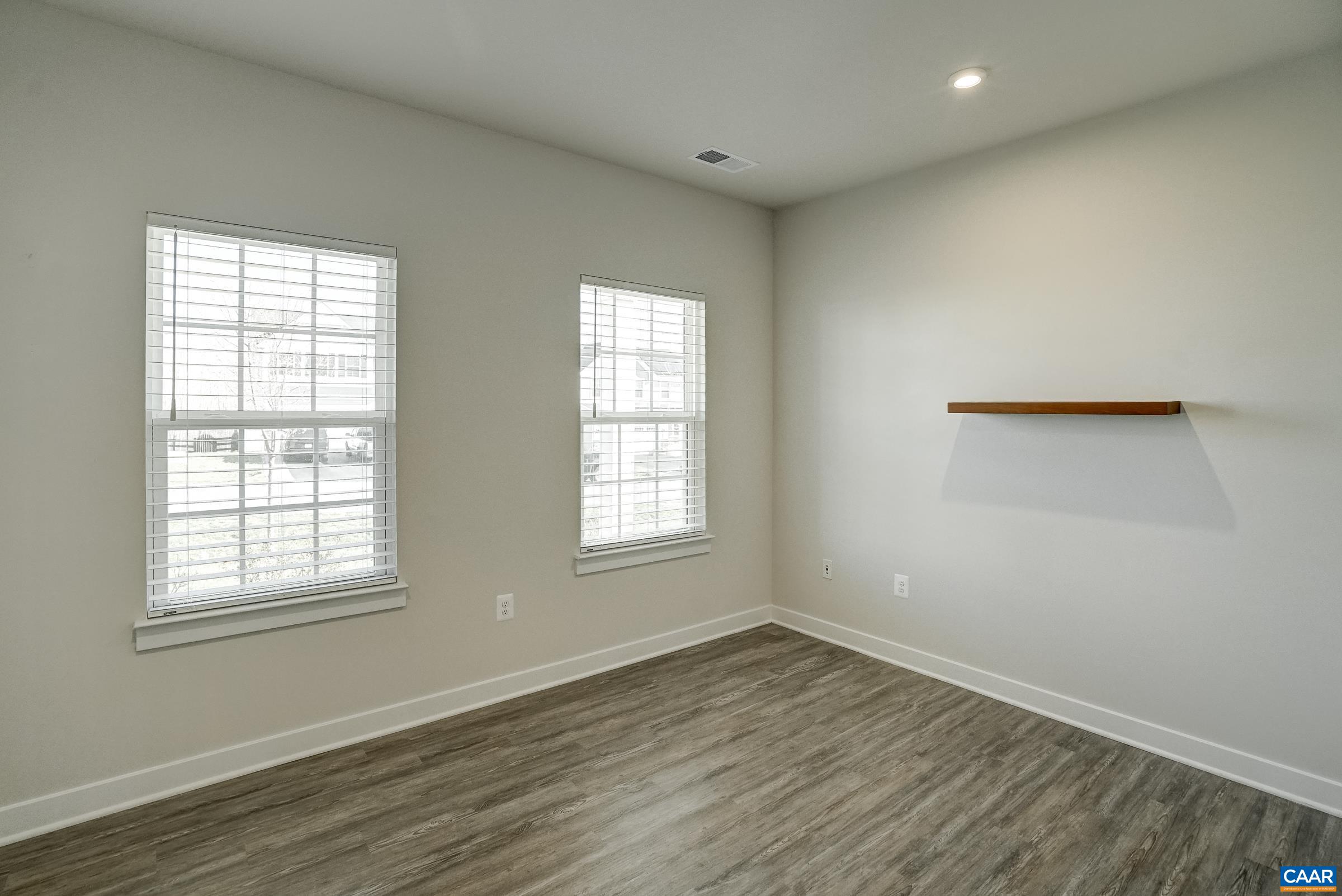 Home office with glass french doors for privacy. Home office with glass french doors for privacy.